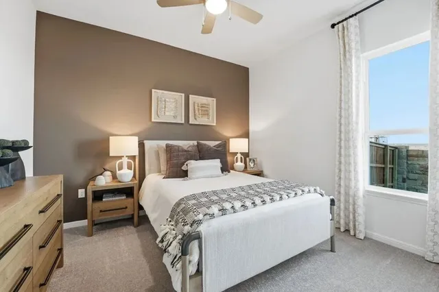 a bathroom with a sink toilet tub and shower
