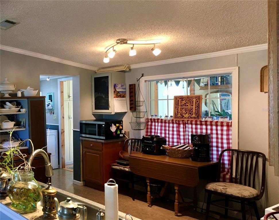 1297 Pfundstein Road Babson Park, FL 33827 - Photo 13 of 65 a bedroom with furniture and a window