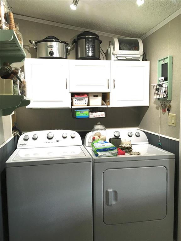 1297 Pfundstein Road Babson Park, FL 33827 - Photo 15 of 65 a utility room with washer and dryer
