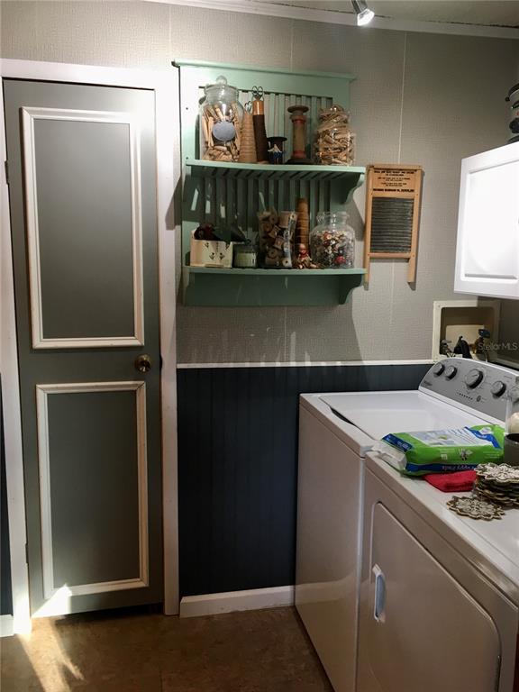 1297 Pfundstein Road Babson Park, FL 33827 - Photo 16 of 65 a utility room with washer and dryer