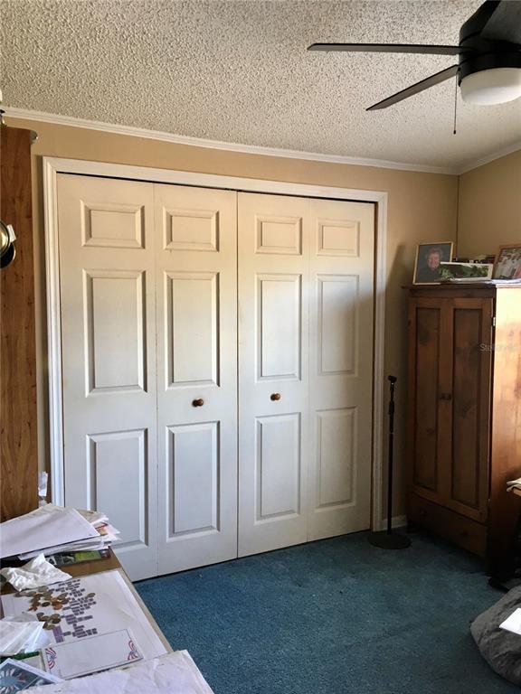 1297 Pfundstein Road Babson Park, FL 33827 - Photo 31 of 65 a view of a closet area with an empty room