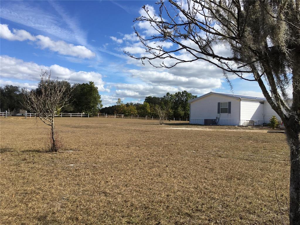 1297 Pfundstein Road Babson Park, FL 33827 - Photo 41 of 65 a view of a house with a yard