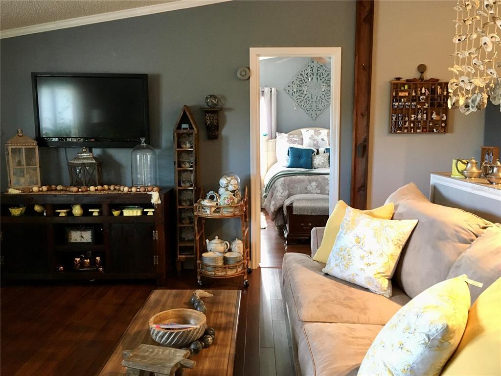 1297 Pfundstein Road Babson Park, FL 33827 - Photo 10 of 65 a living room with furniture and a flat screen tv