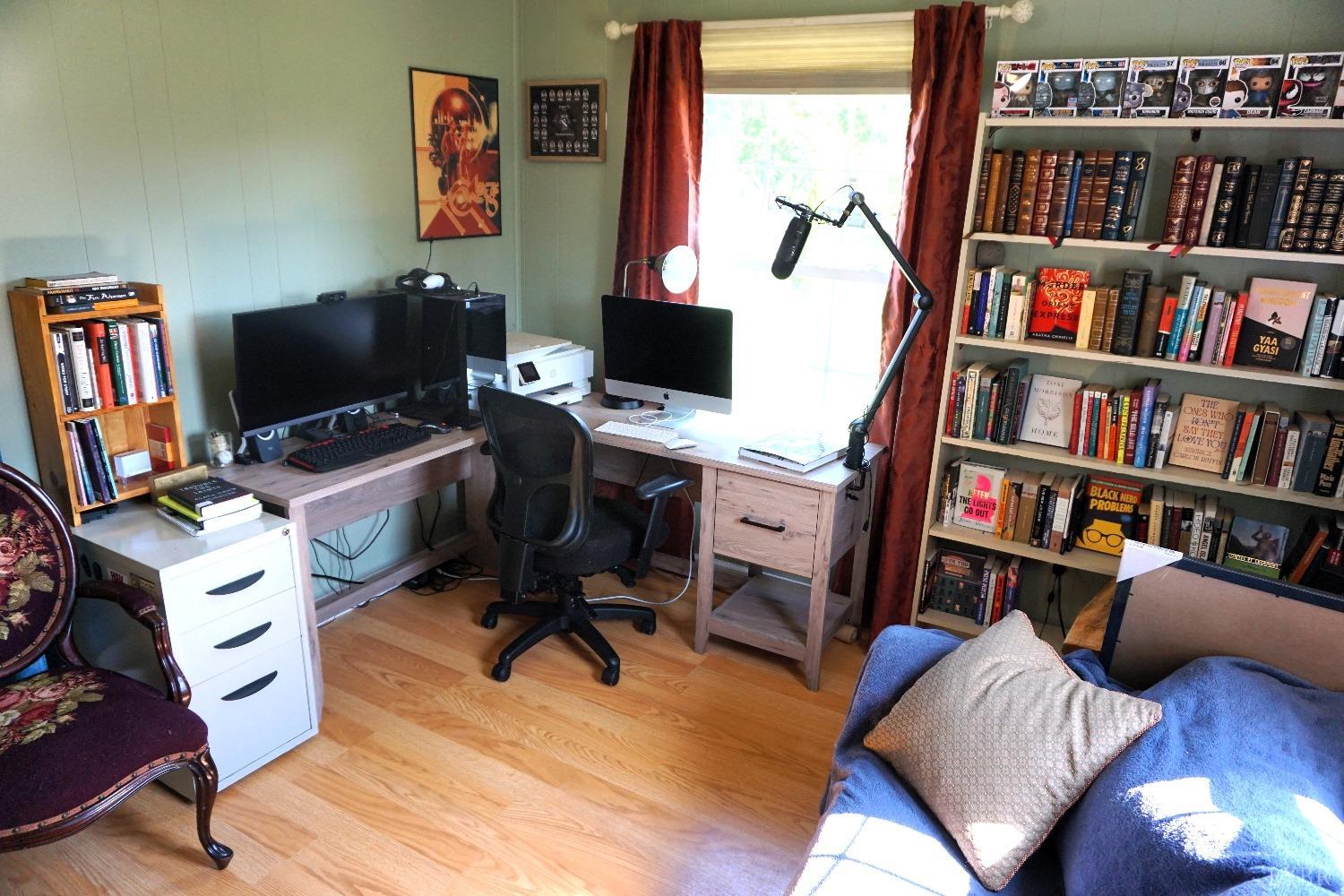26 Pilot View Road Concord, VA 24538 - Photo 18 of 26 a view of a workspace with furniture and a bookshelf