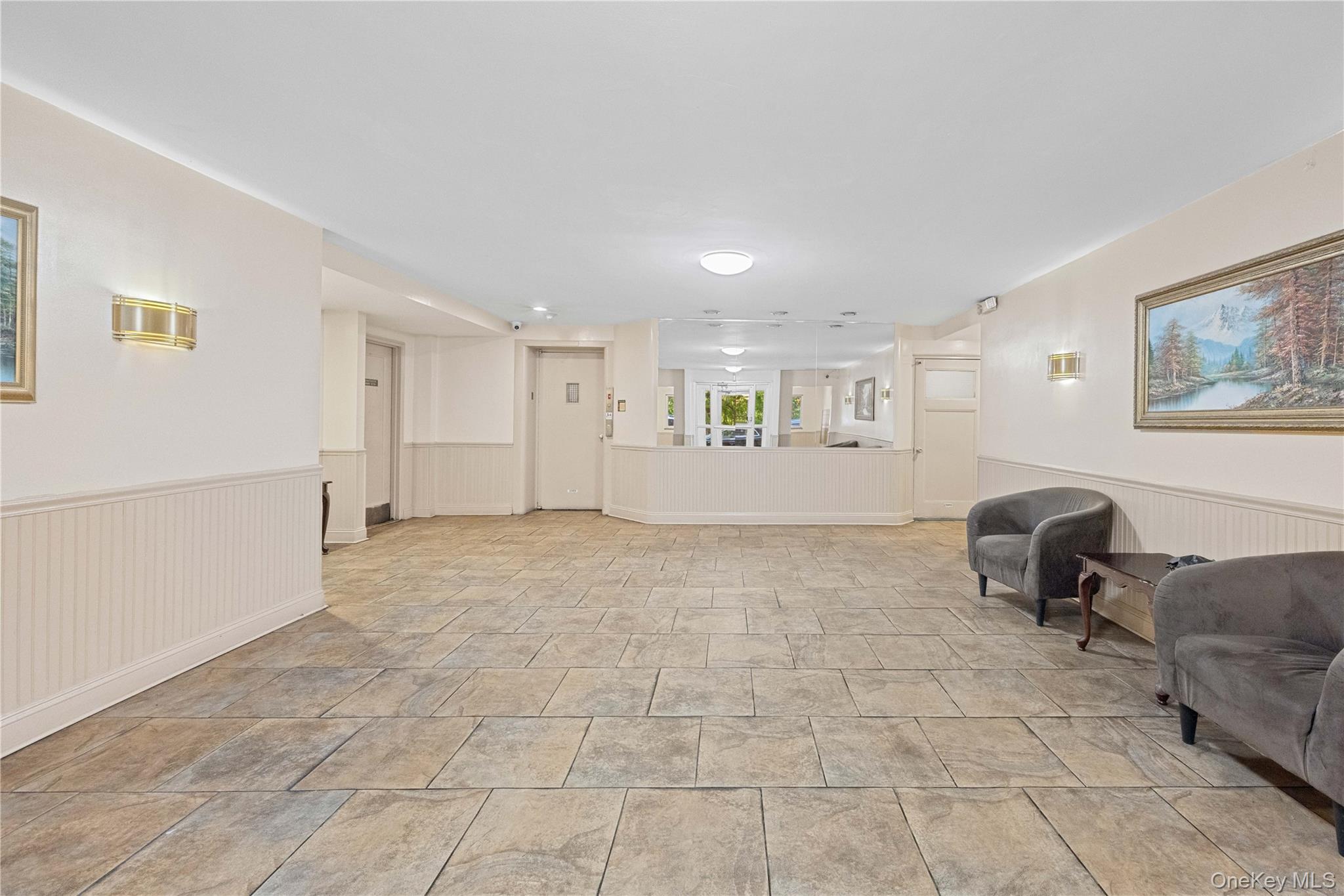 255 Bronx River Road, Unit 4M Yonkers, NY 10704 - Photo 16 of 19 a view of livingroom with furniture and windows