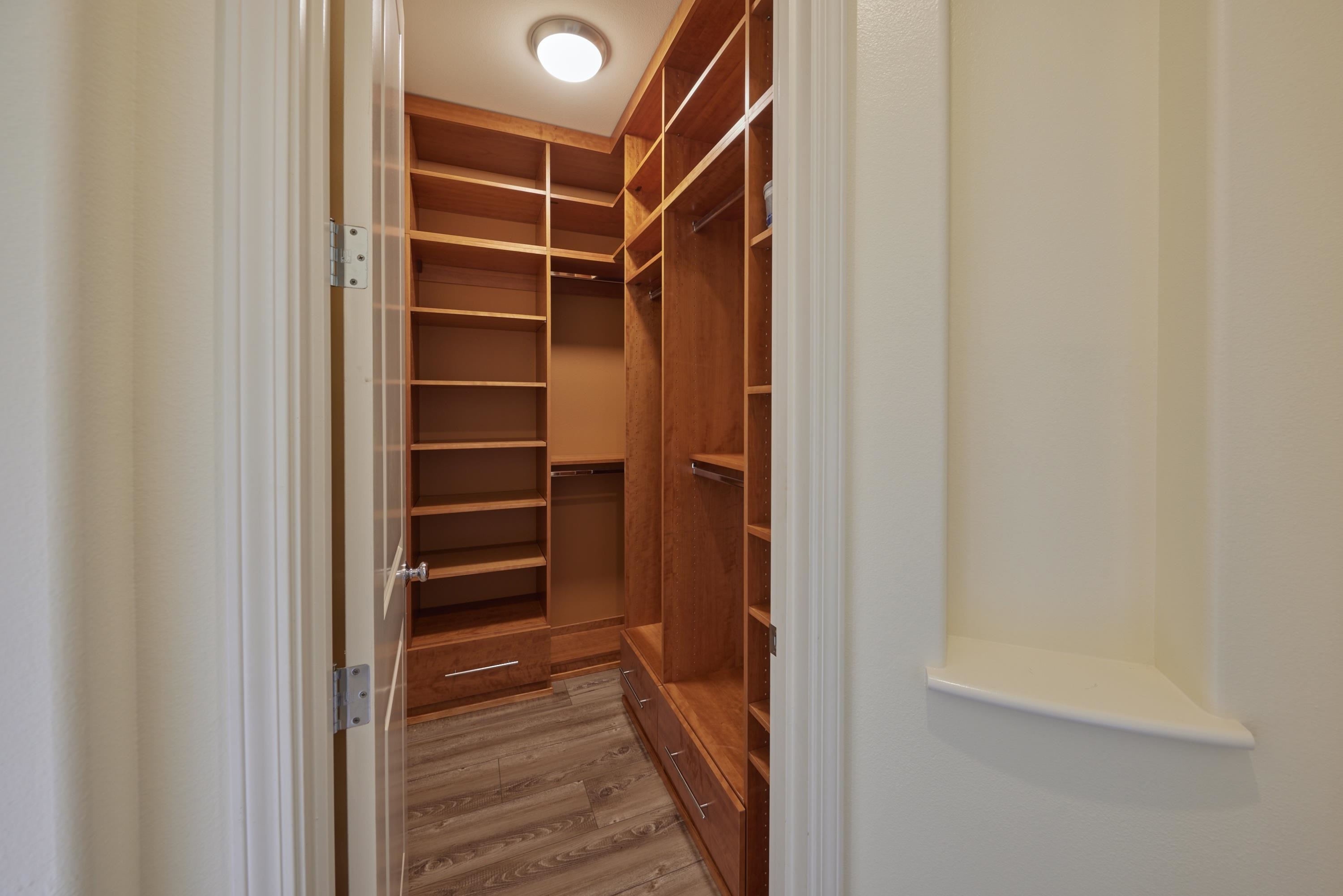 133 Kinohi Loa Loop Wailuku, HI 96793 - Photo 14 of 45 a view of closet area with empty racks