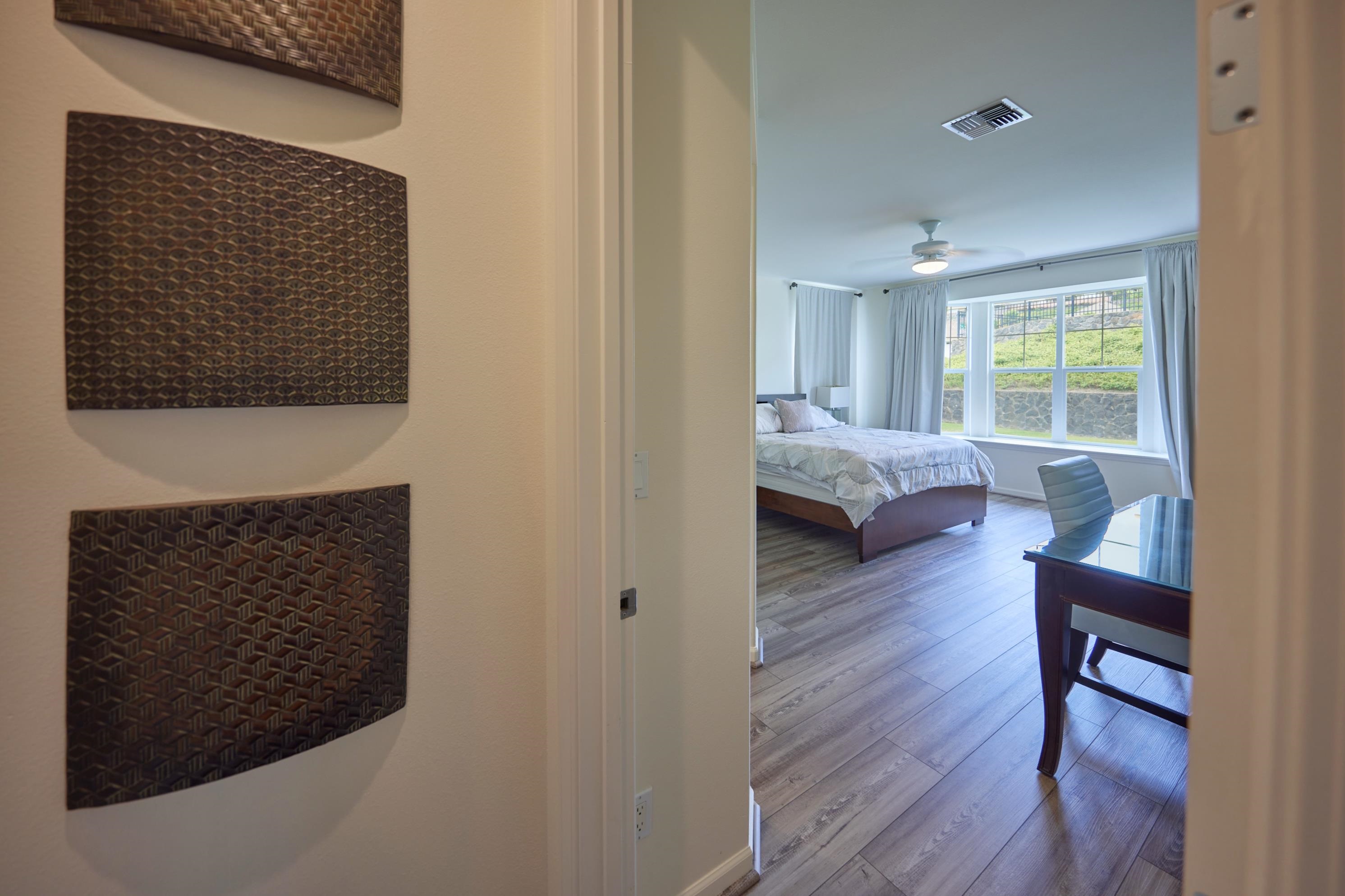 133 Kinohi Loa Loop Wailuku, HI 96793 - Photo 15 of 45 a living room with furniture and a wooden floor