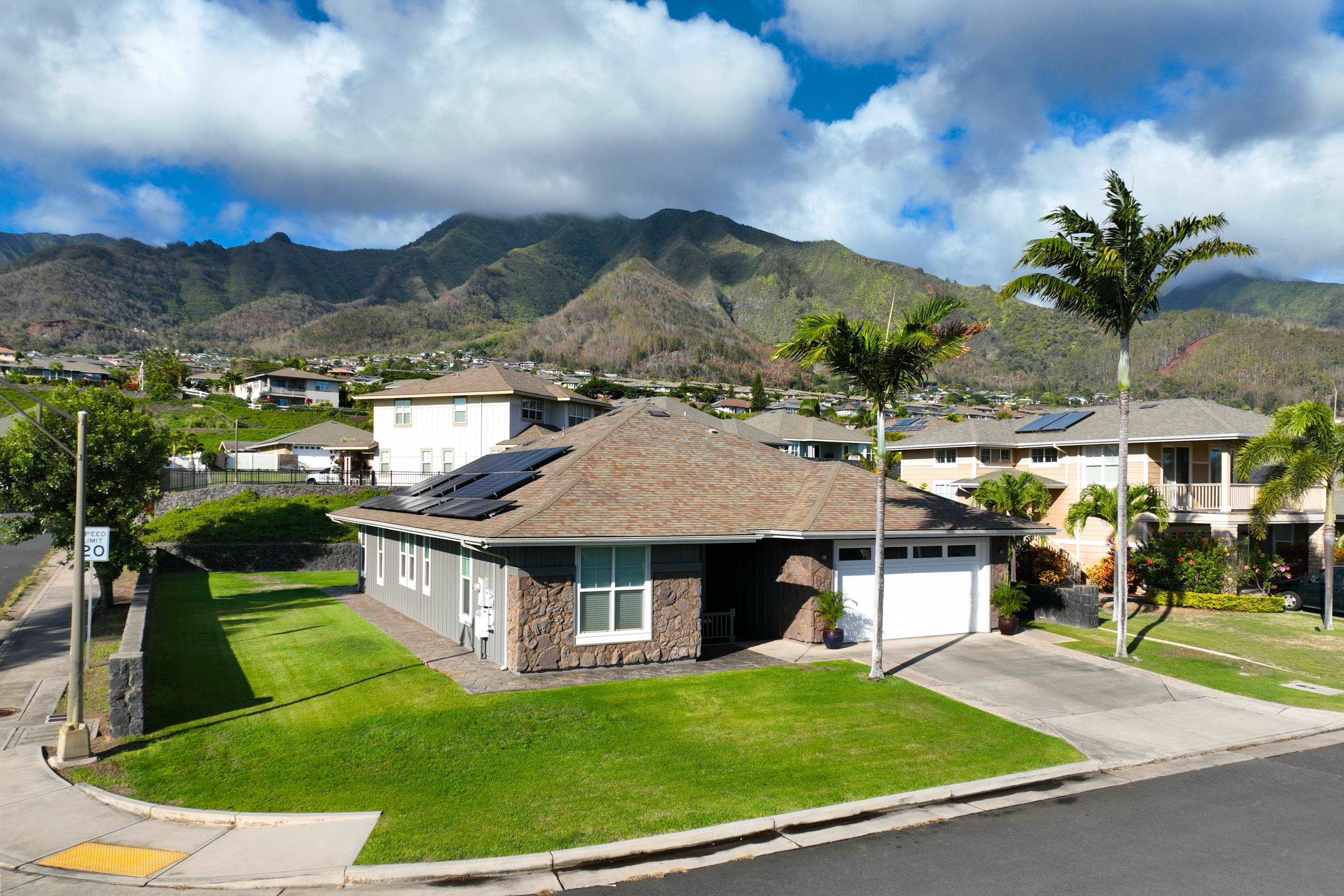 133 Kinohi Loa Loop Wailuku, HI 96793 - Photo 3 of 45 an aerial view of a house with a yard