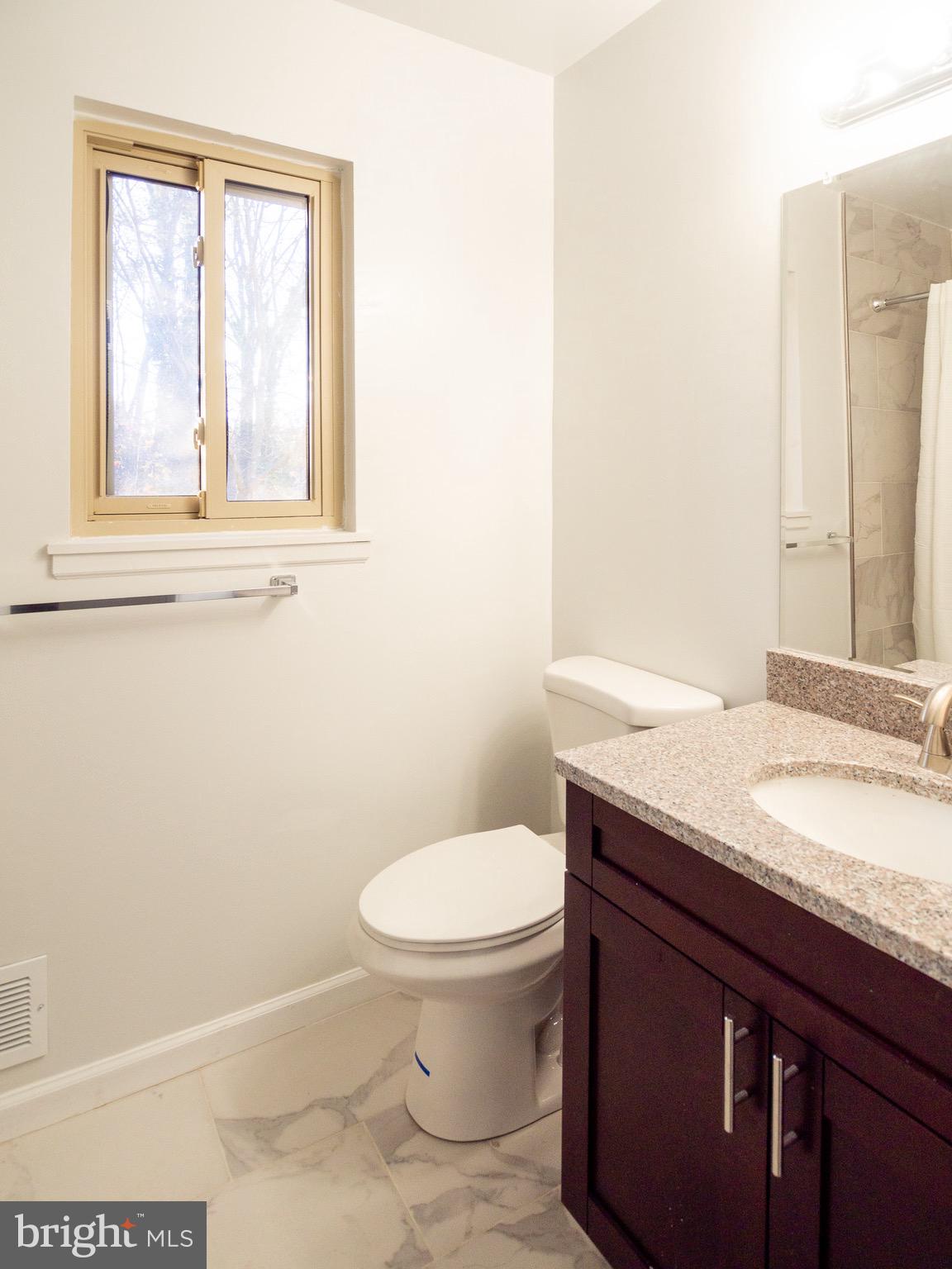 1600 Winding Waye Lane Silver Spring, MD 20902 - Photo 21 of 25 Hallway Bathroom