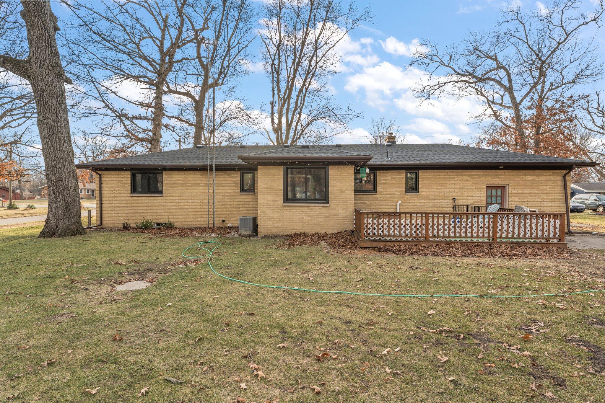 12163 North 900 West Demotte, IN 46310 - Photo 2 of 23 a view of a house with a fence