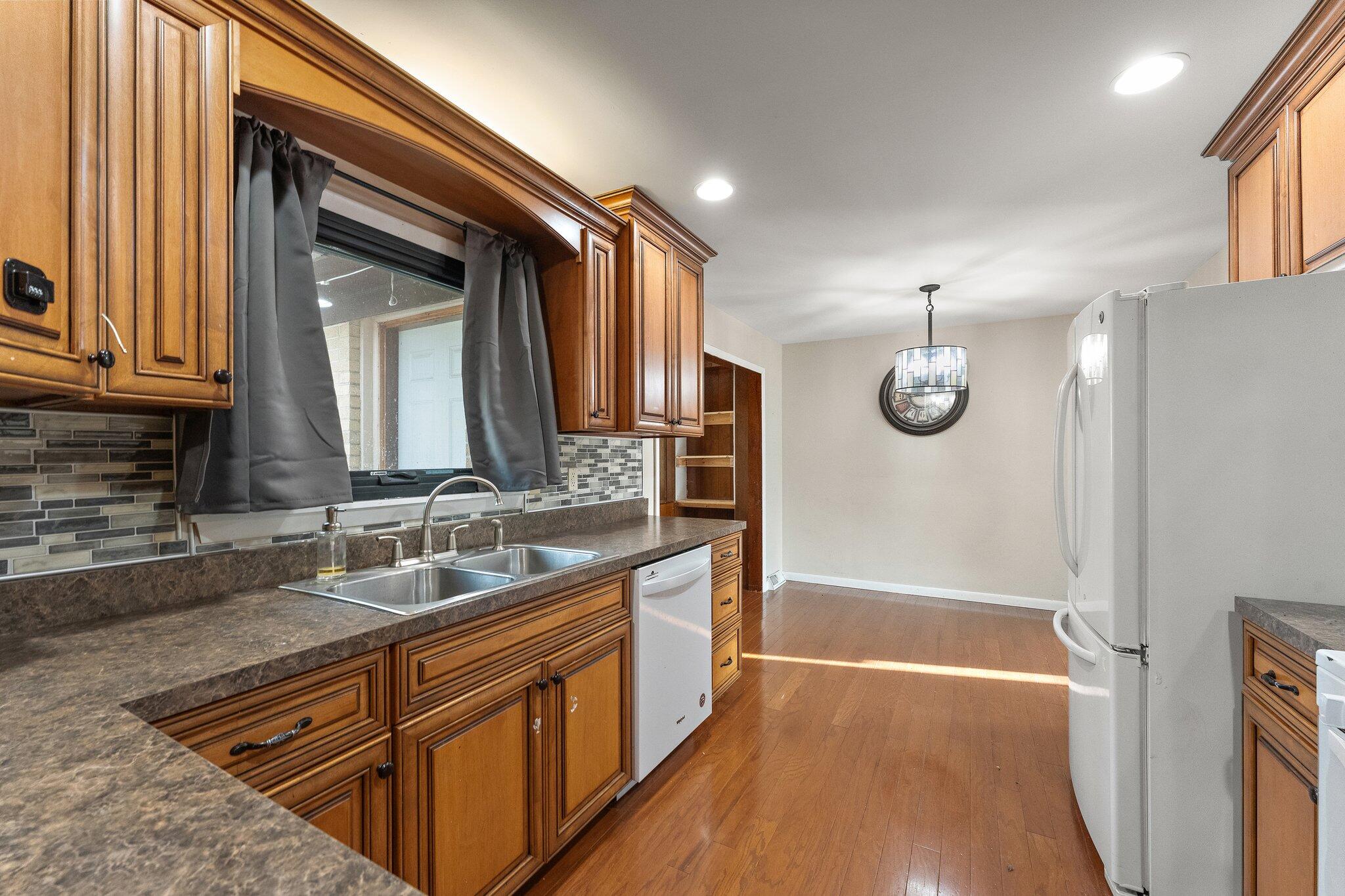 12163 North 900 West Demotte, IN 46310 - Photo 7 of 23 a bathroom with double vanity sink and a mirror