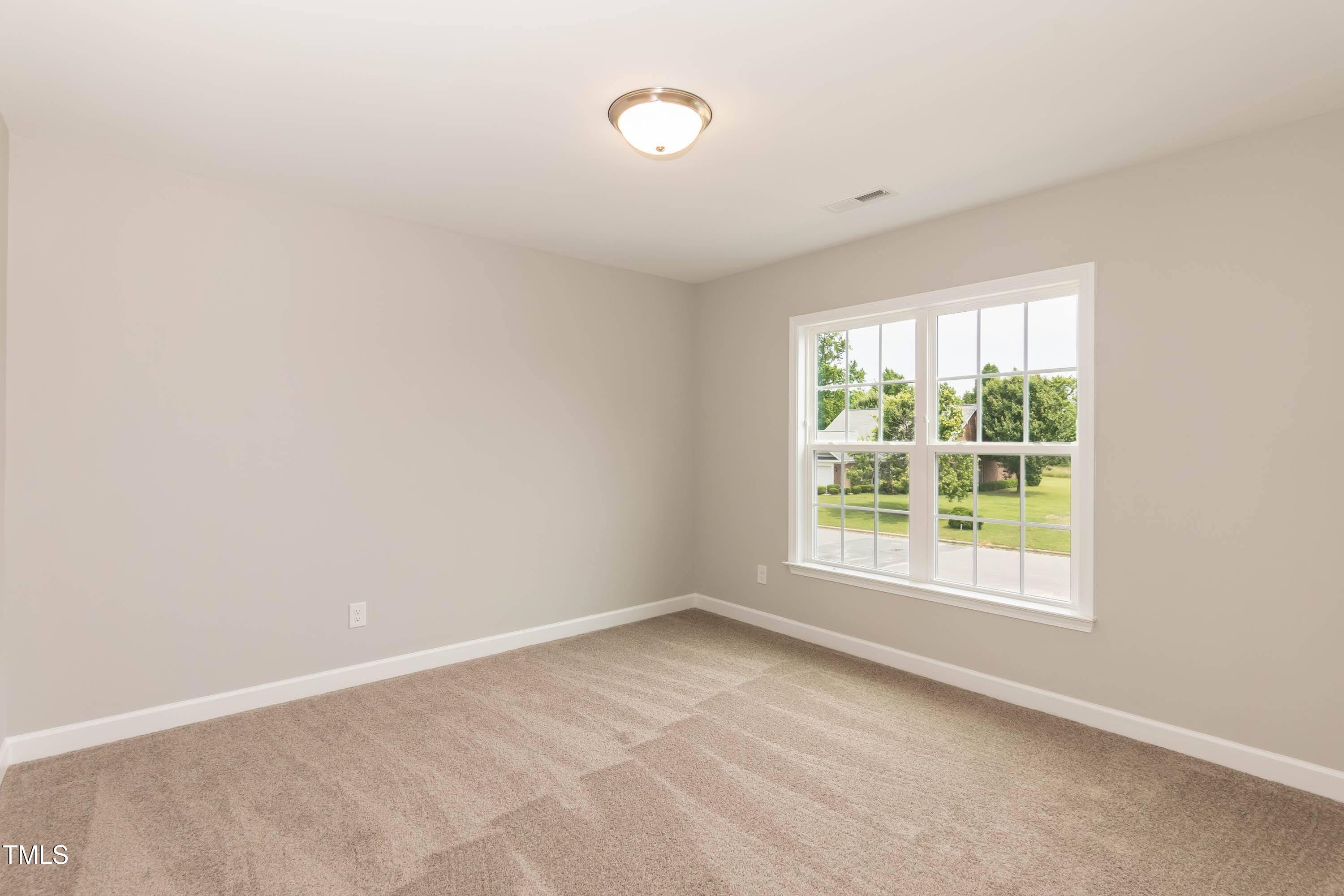 748 Rivers Edge Parkway Roanoke Rapids, NC 27870 - Photo 14 of 42 an empty room with a window
