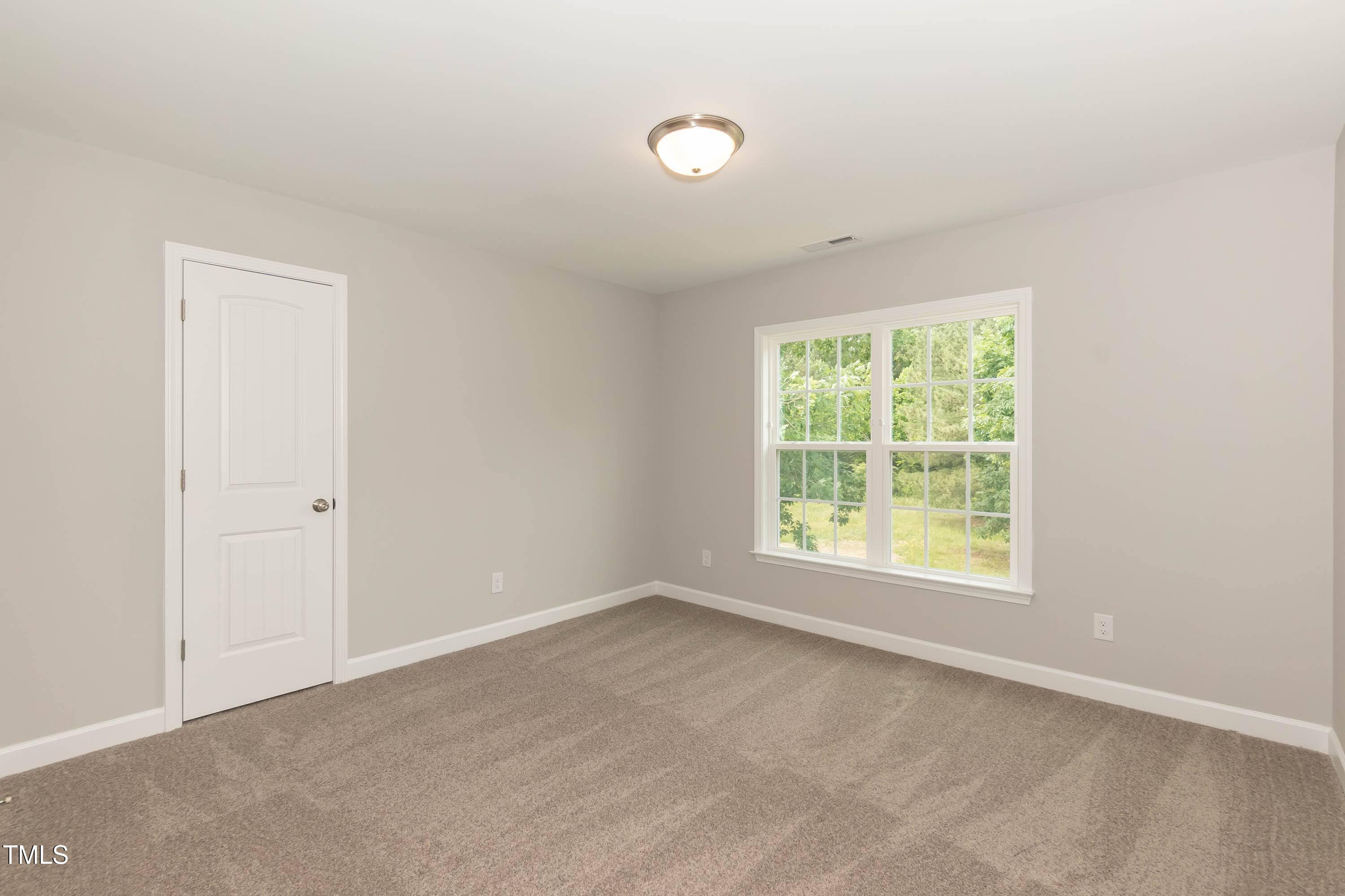 748 Rivers Edge Parkway Roanoke Rapids, NC 27870 - Photo 16 of 42 an empty room with a window