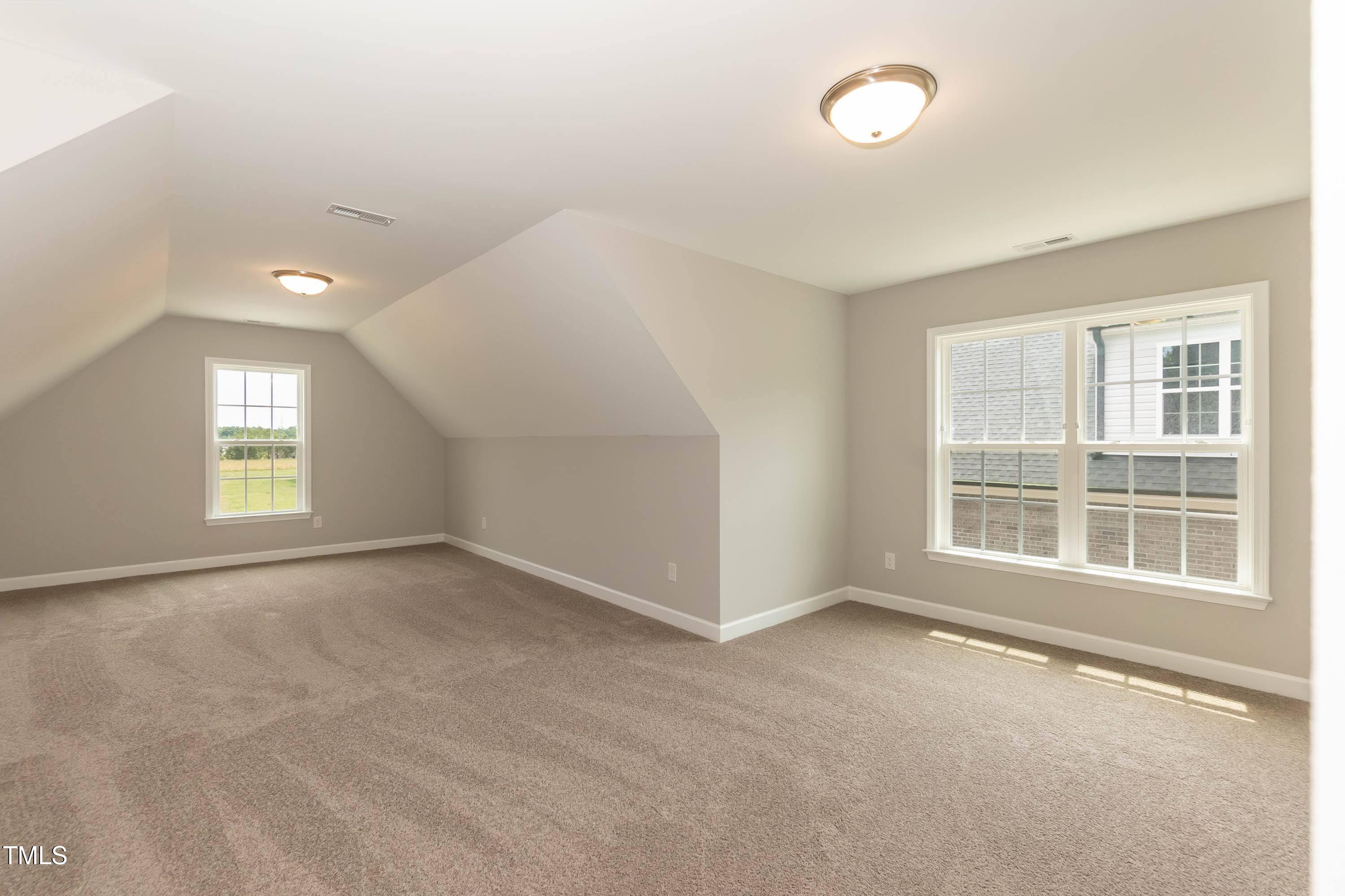 748 Rivers Edge Parkway Roanoke Rapids, NC 27870 - Photo 19 of 42 an empty room with windows