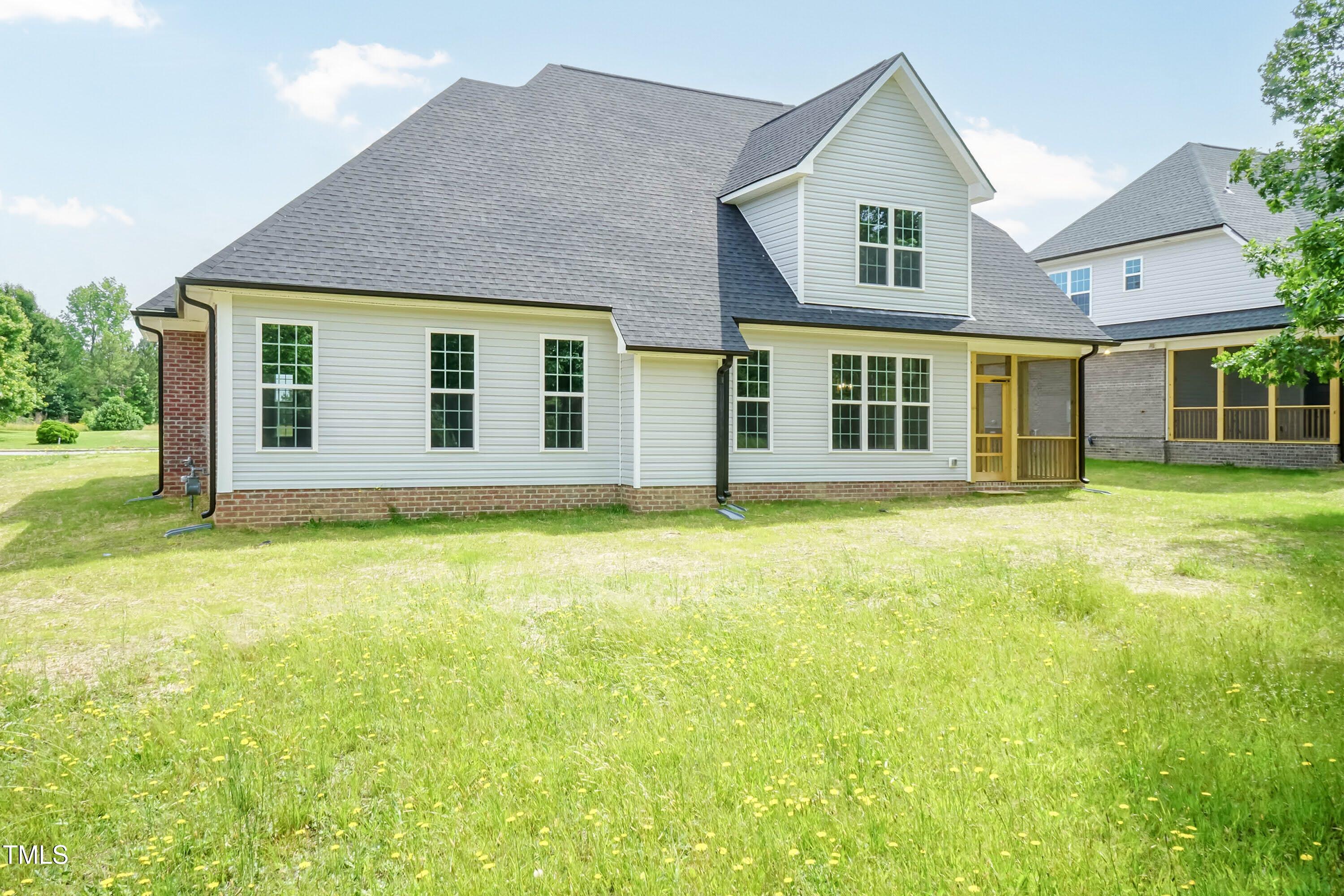 748 Rivers Edge Parkway Roanoke Rapids, NC 27870 - Photo 22 of 42 front view of a house with a yard