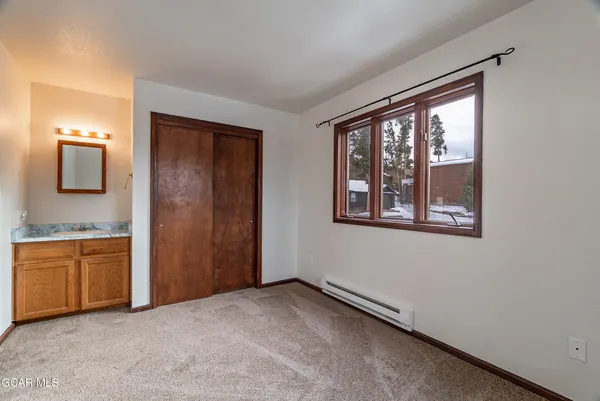 an empty room that has a window