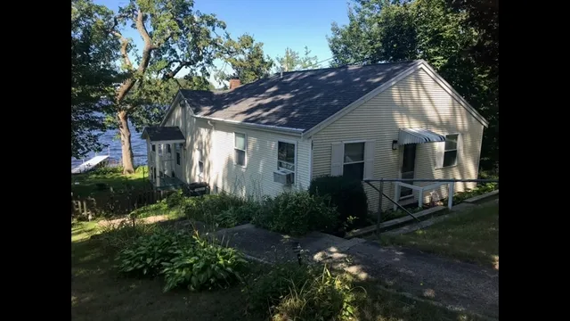 a house view with a garden space