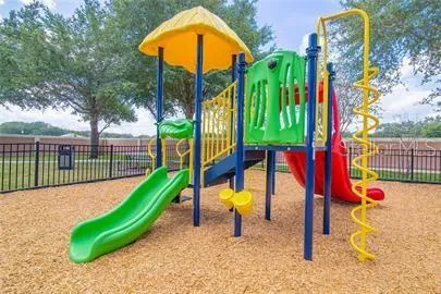 a view of a park with a slide