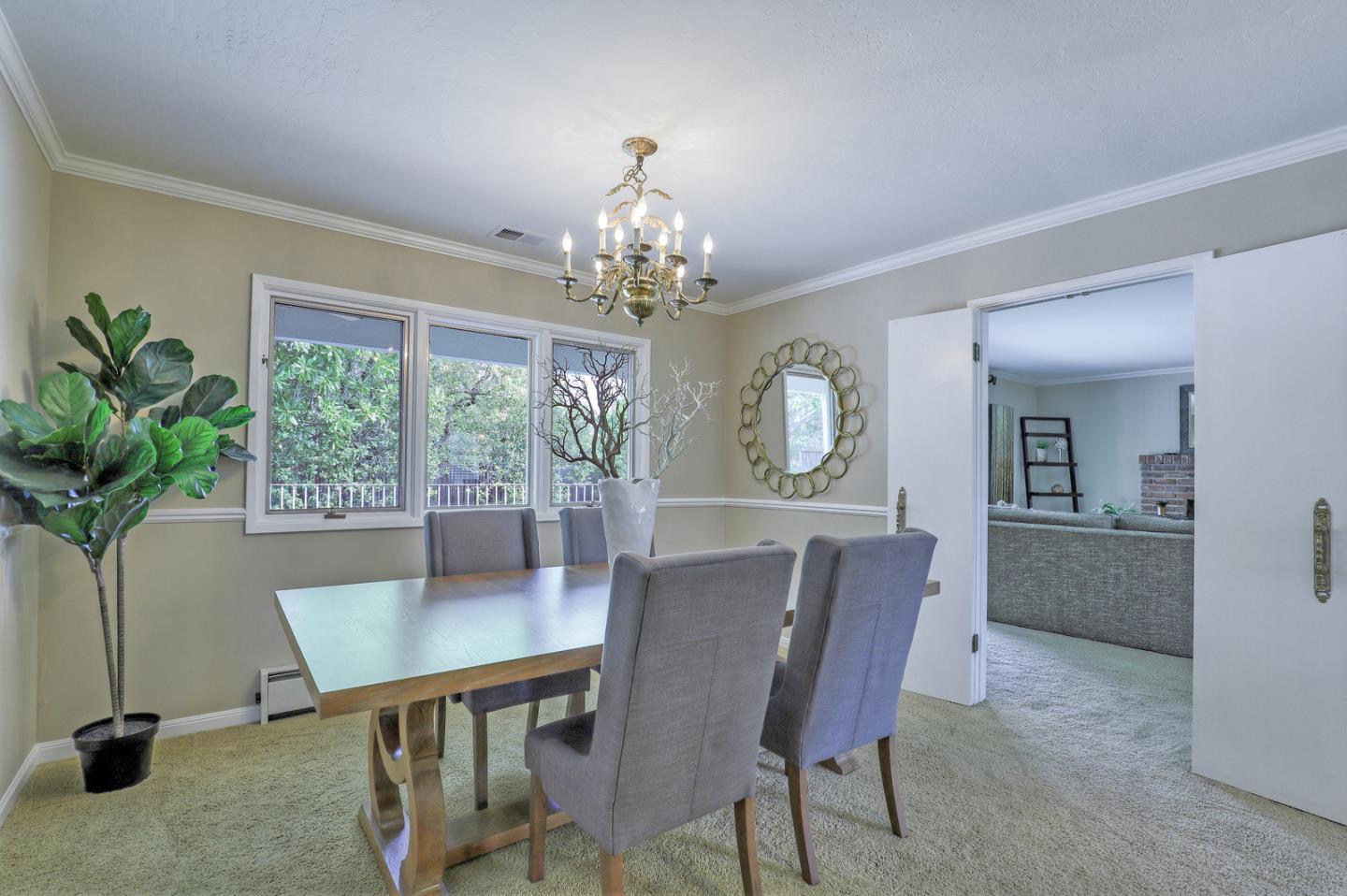 19923 Lanark Lane Saratoga, CA 95070 - Photo 17 of 34 a view of a dining room with furniture window and outside view