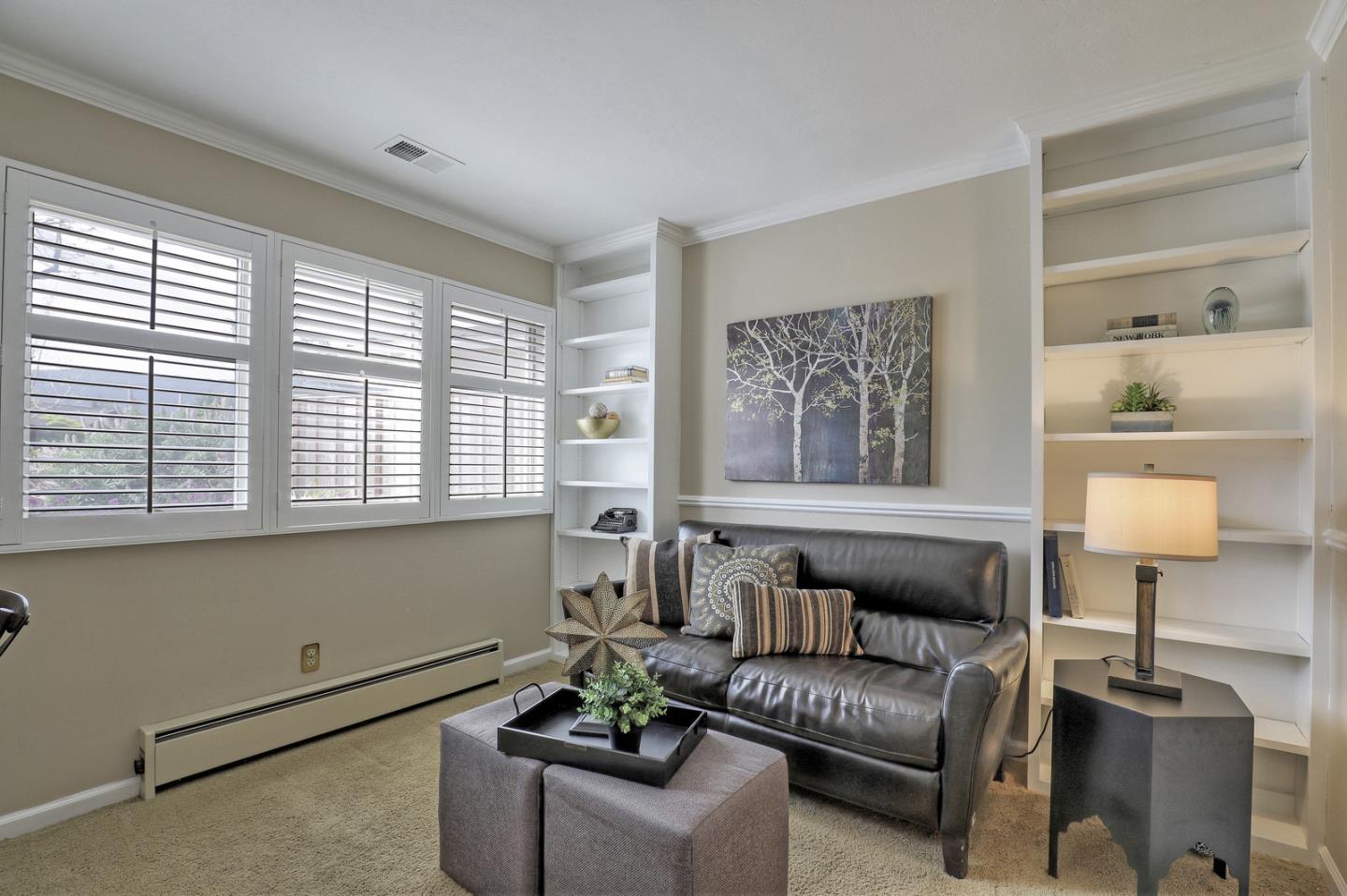 19923 Lanark Lane Saratoga, CA 95070 - Photo 19 of 34 a living room with furniture and a lamp