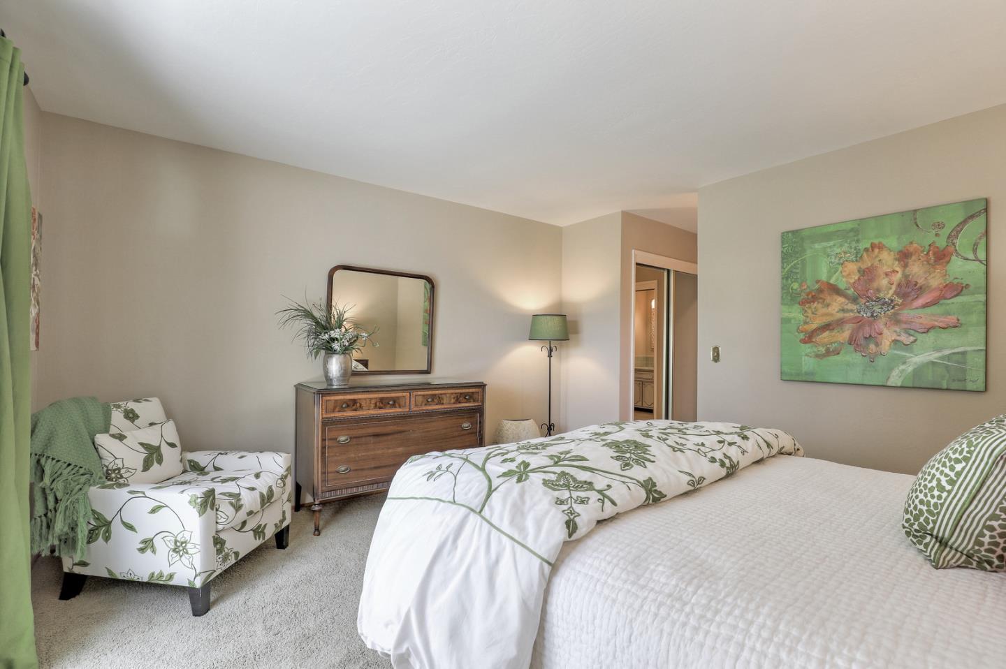 19923 Lanark Lane Saratoga, CA 95070 - Photo 23 of 34 a bedroom with a bed and a couch