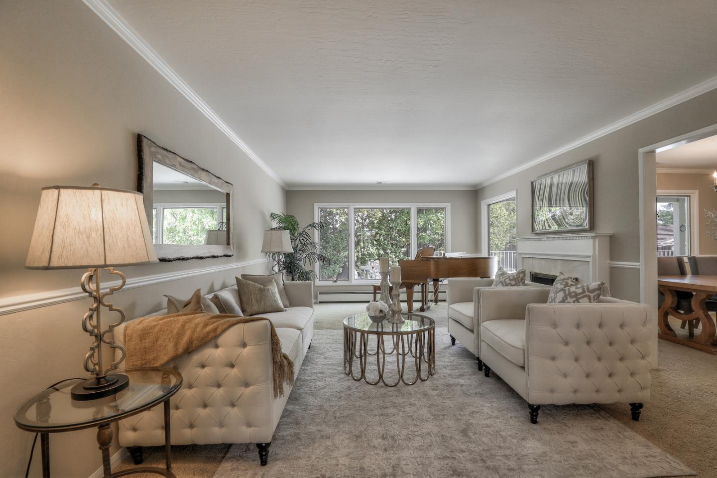19923 Lanark Lane Saratoga, CA 95070 - Photo 7 of 34 a living room with furniture and a lamp