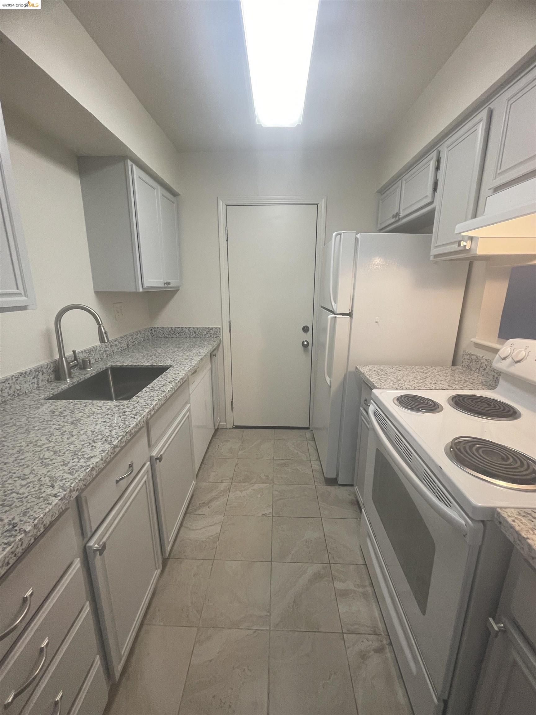 1096 Mohr Lane Concord, CA 94518 - Photo 15 of 34 a kitchen that has a sink and a stove