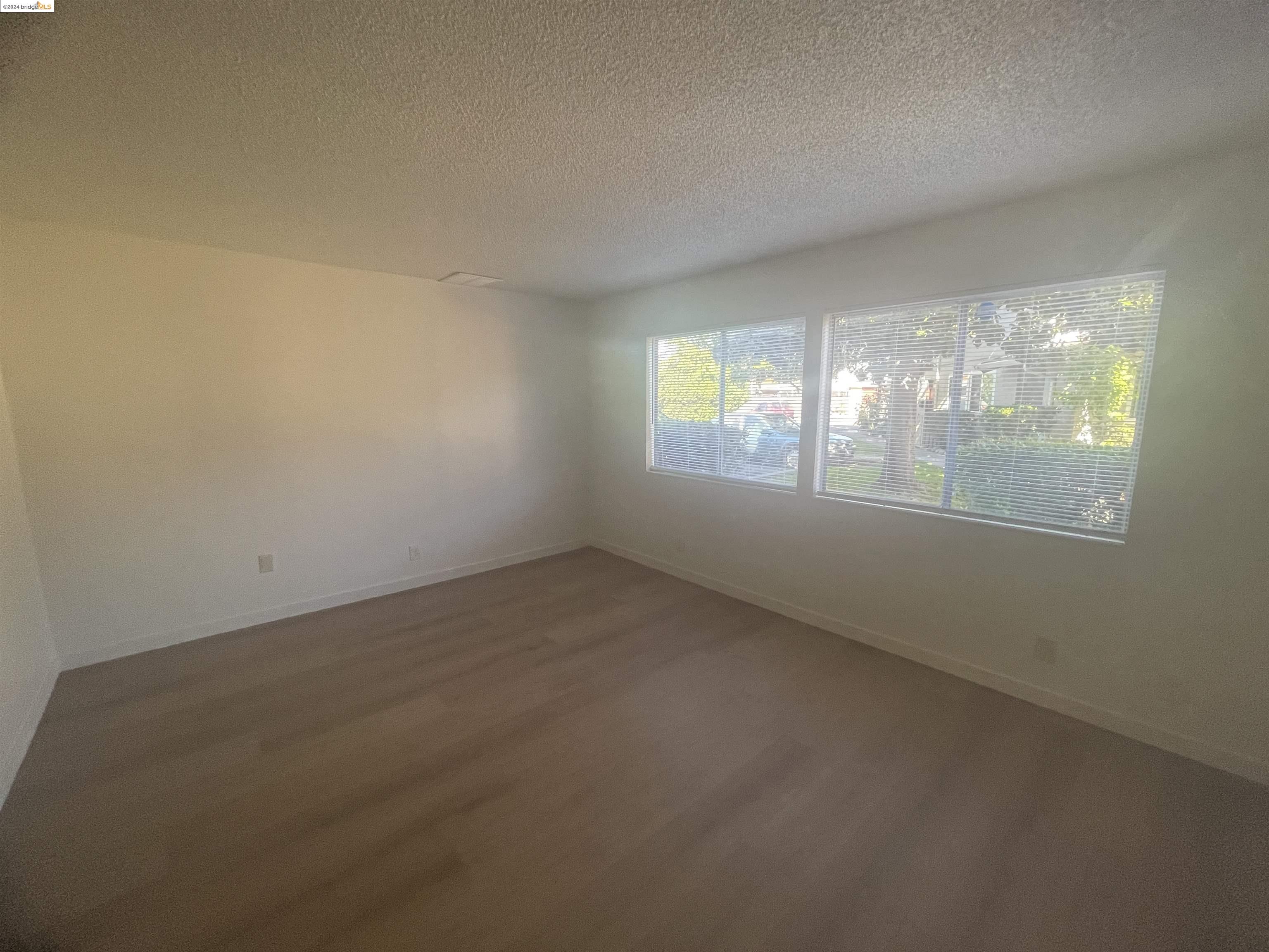 1096 Mohr Lane Concord, CA 94518 - Photo 20 of 34 an empty room with windows