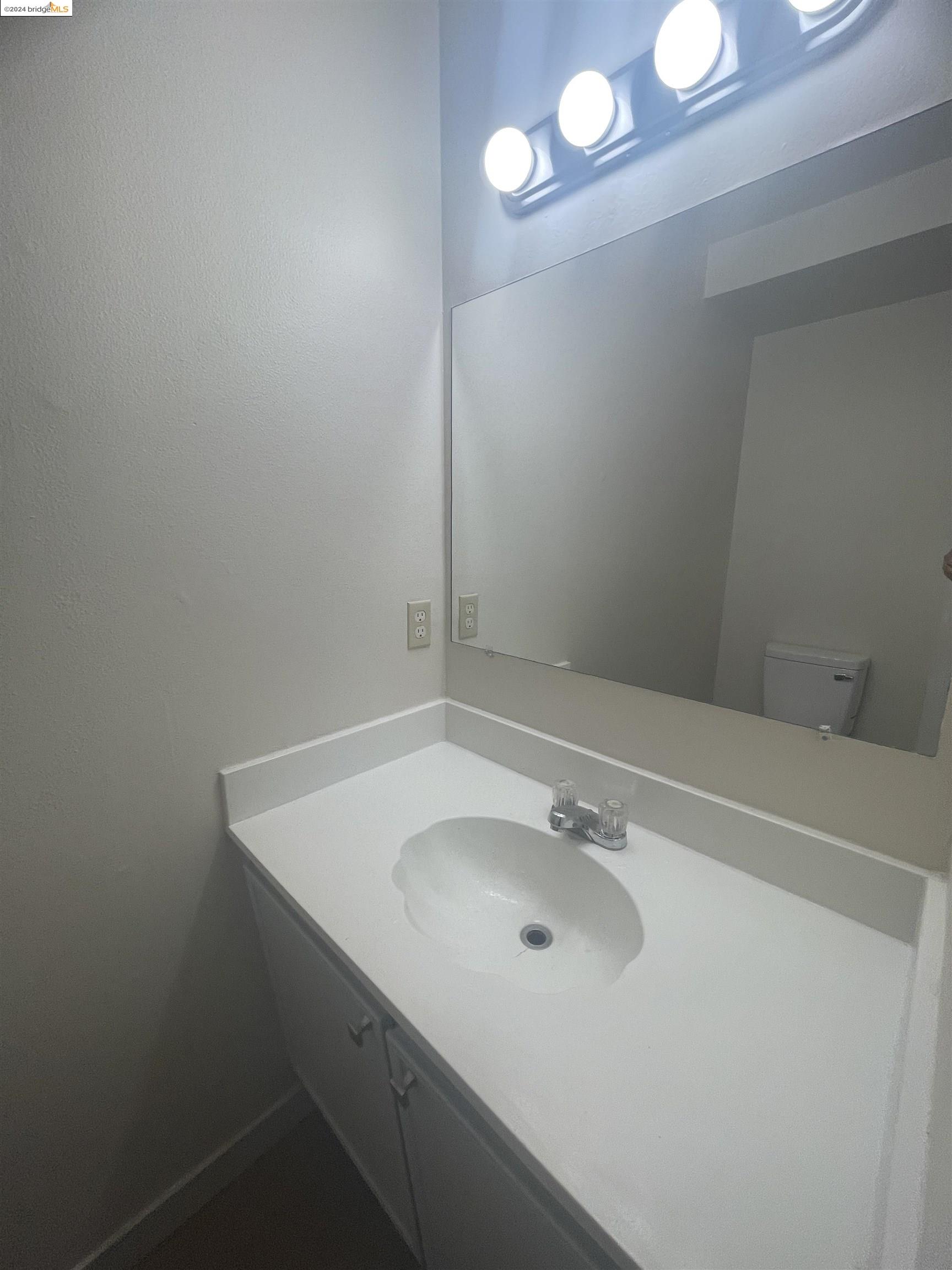 1096 Mohr Lane Concord, CA 94518 - Photo 22 of 34 a bathroom with a sink and a vanity