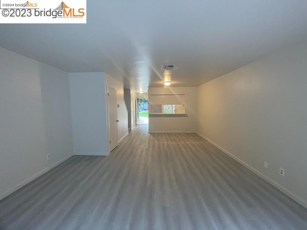 1096 Mohr Lane Concord, CA 94518 - Photo 5 of 34 a view of empty room with wooden floor