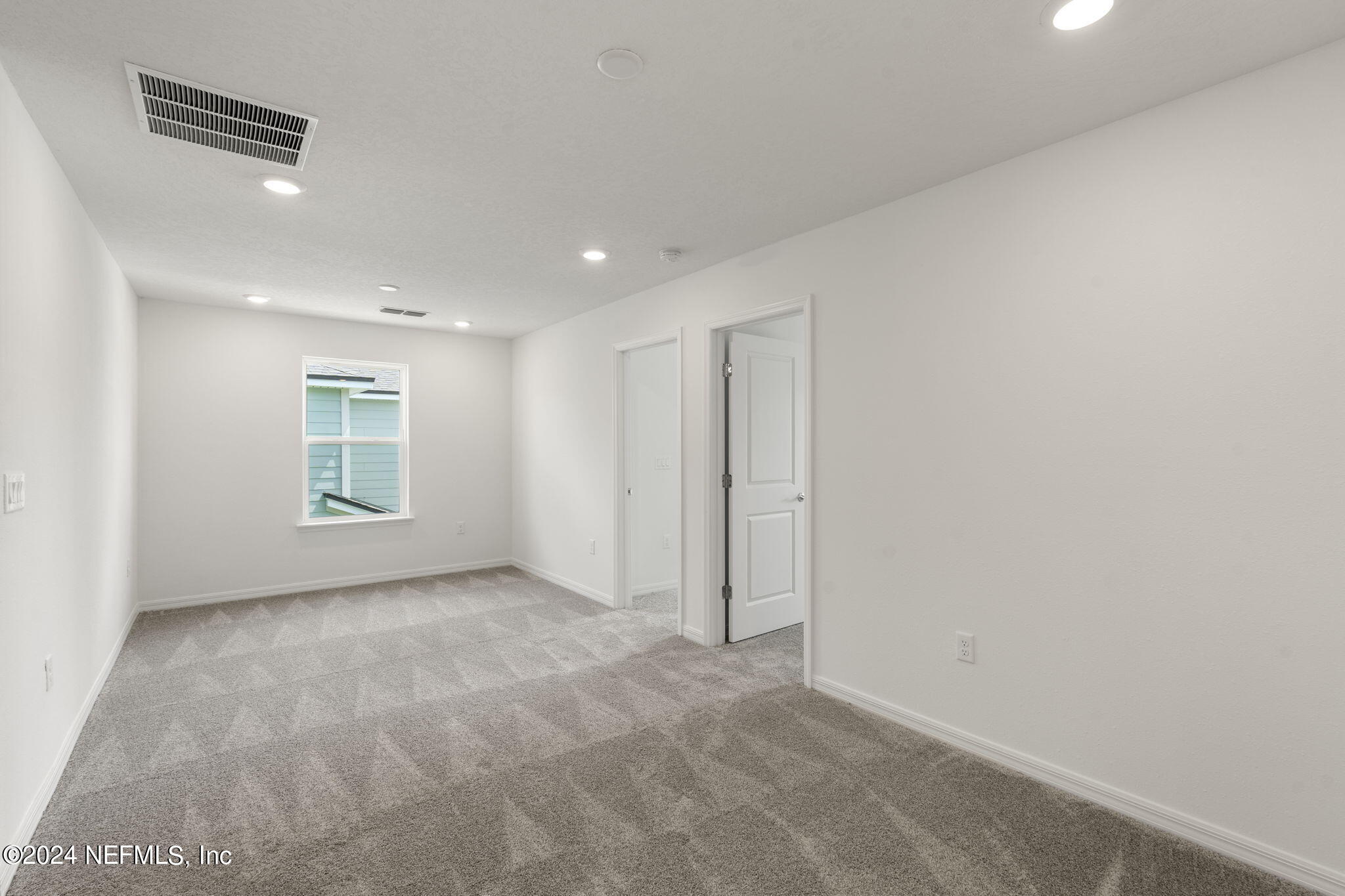 54 Torres Trace St. Augustine, FL 32095 - Photo 15 of 31 a view of an empty room with a window