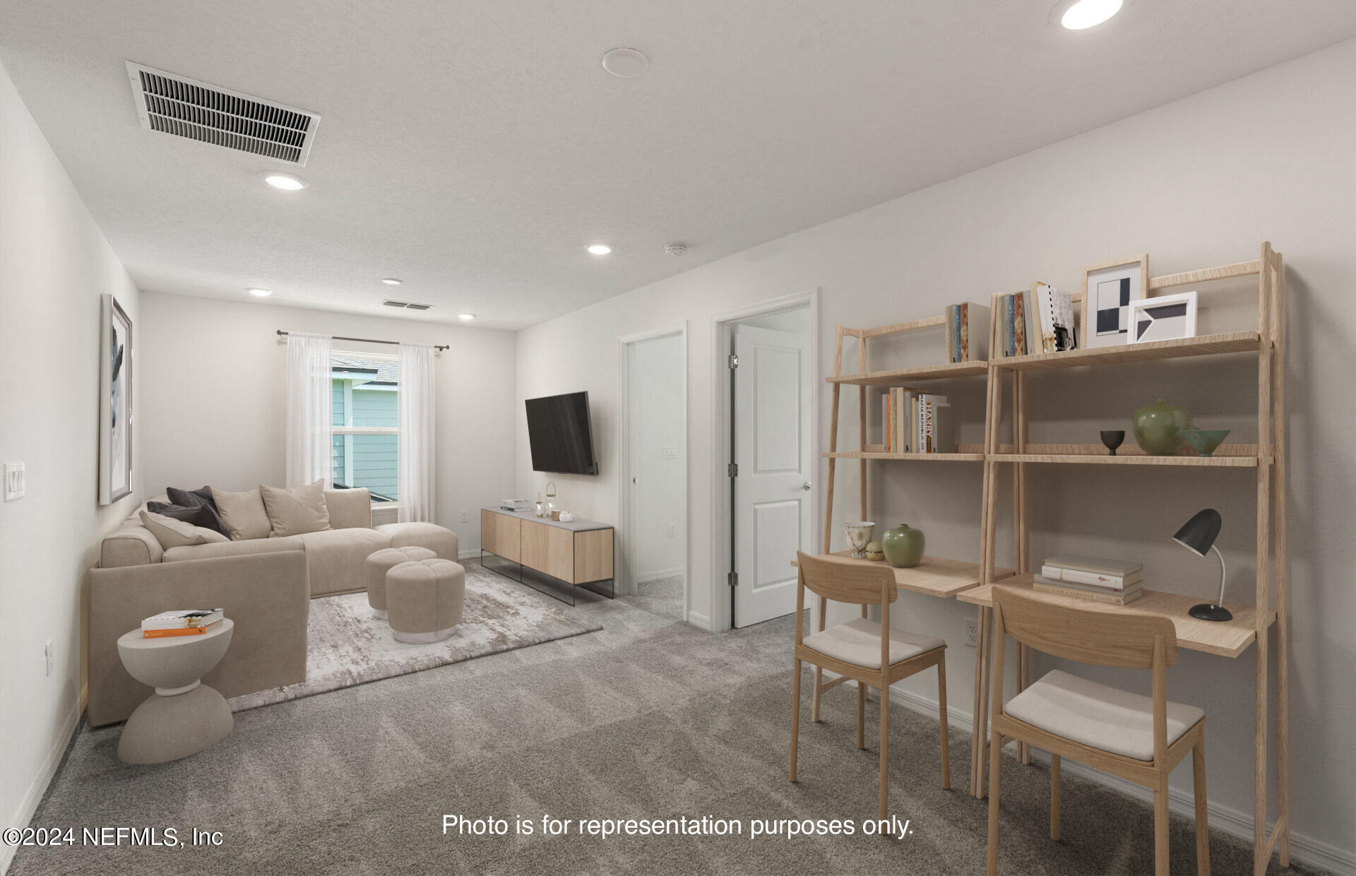 54 Torres Trace St. Augustine, FL 32095 - Photo 16 of 31 a living room with furniture and a flat screen tv