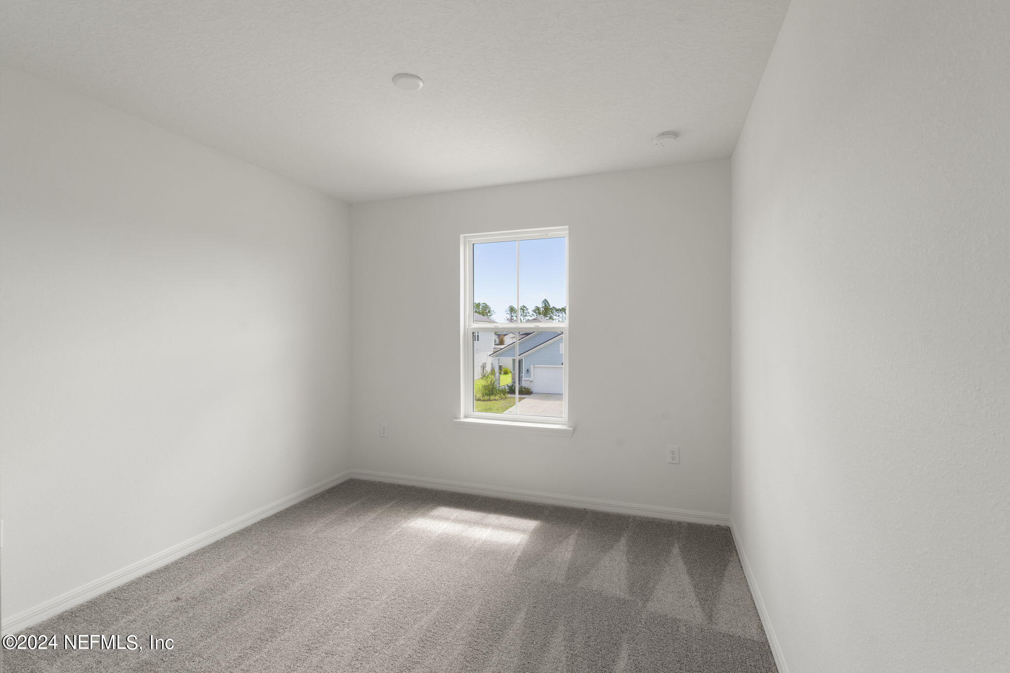 54 Torres Trace St. Augustine, FL 32095 - Photo 26 of 31 an empty room with windows