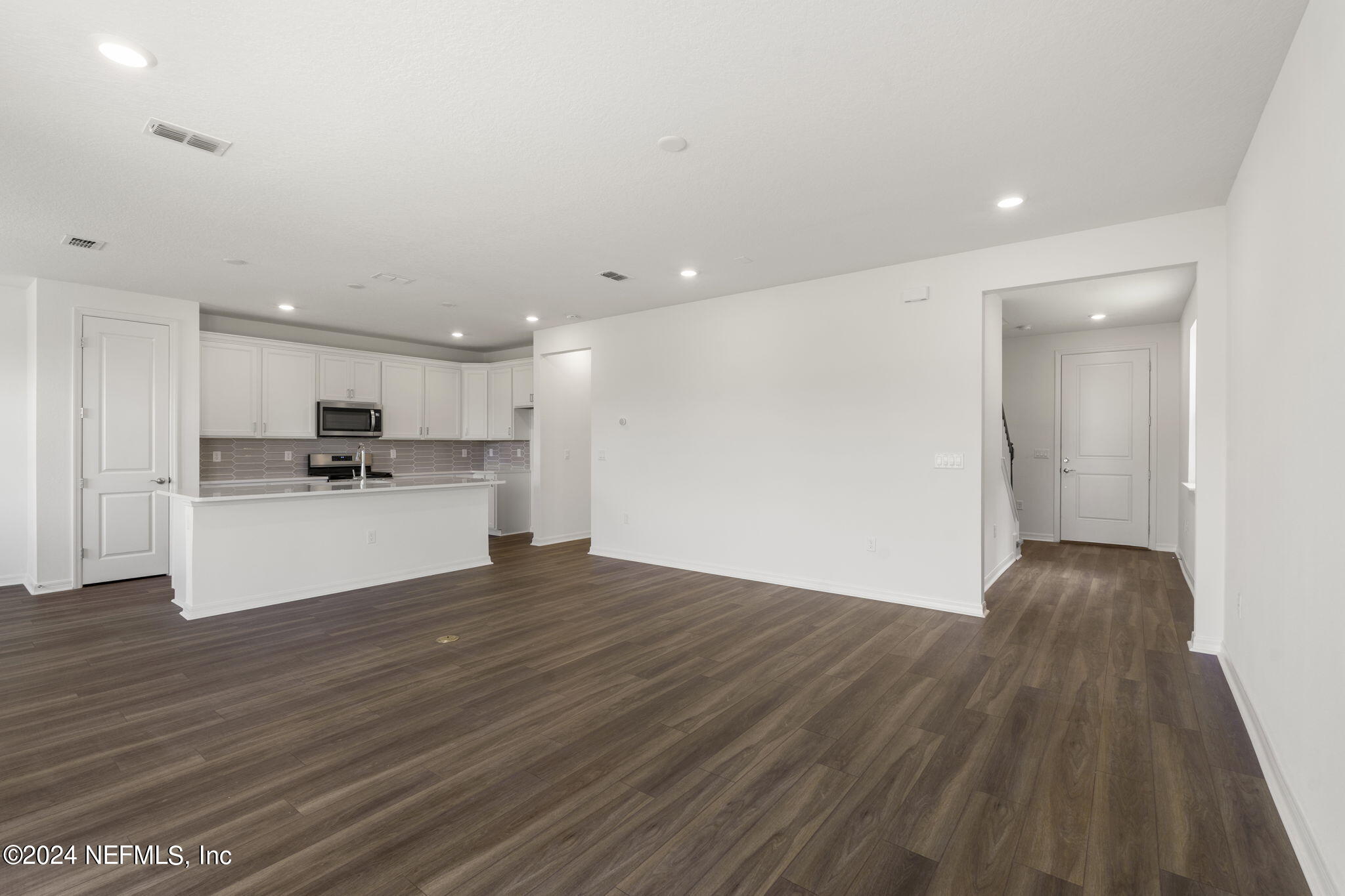 54 Torres Trace St. Augustine, FL 32095 - Photo 4 of 31 a view of kitchen with wooden floor