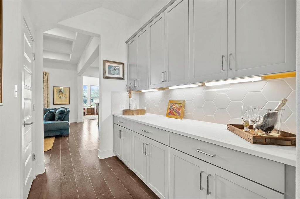 208 Slate Rock Terrace Austin, TX 78738 - Photo 17 of 29 a kitchen with cabinets and window