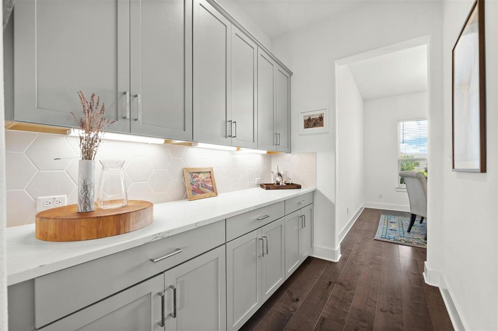 208 Slate Rock Terrace Austin, TX 78738 - Photo 18 of 29 a kitchen with sink and cabinets