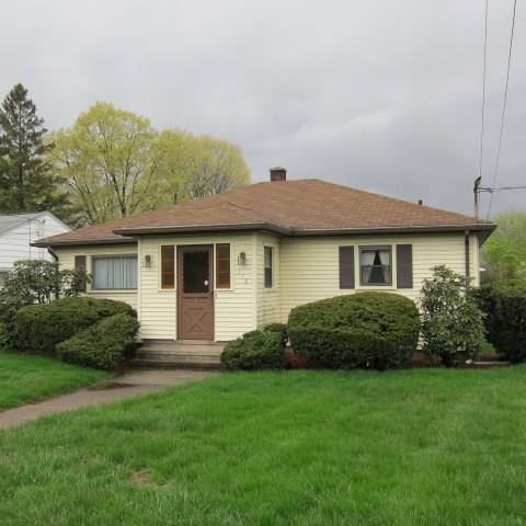 a view of a house with a garden