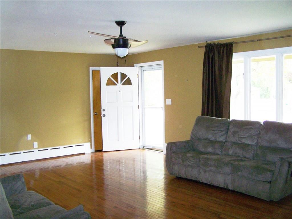 6 Smith Road Springvale, ME 04083 - Photo 2 of 15 Living room entrance. Nice hardwood...