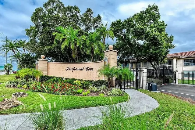 a view of a dining area with furniture and a chandelier