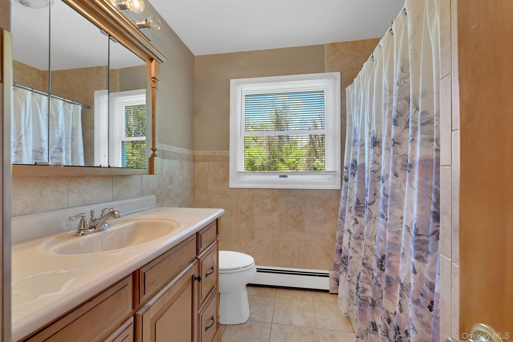 190 Ridge Road Highland Mills, NY 10930 - Photo 37 of 49 This full bath is located on the same level as the three bedrooms.