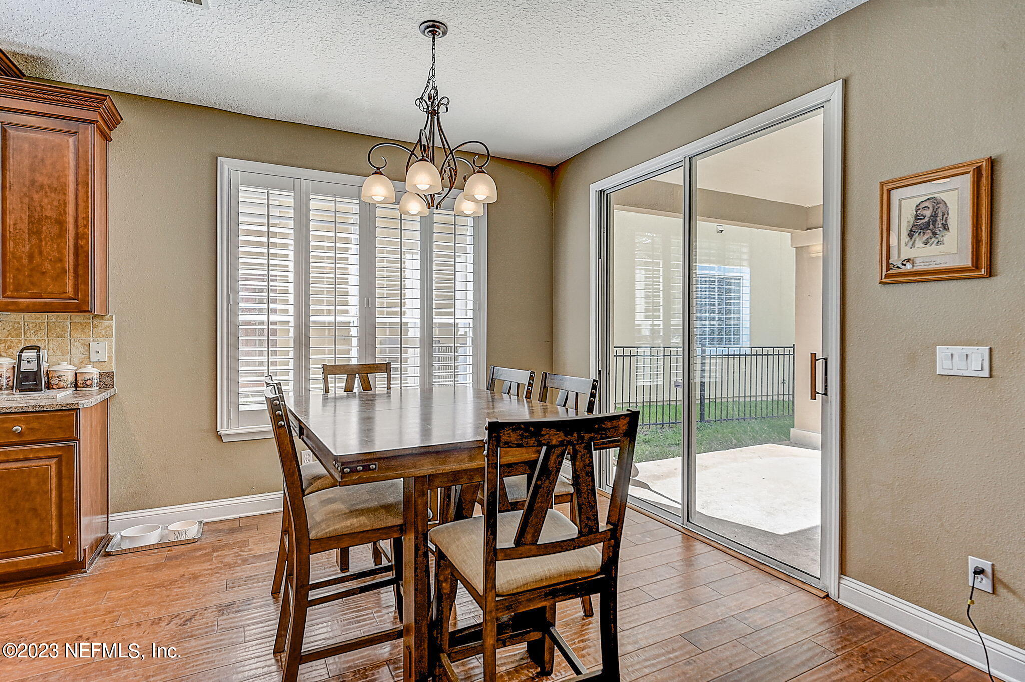 1828 Rear Admiral Lane St. Johns, FL 32259 - Photo 11 of 48 a view of a dining room with furniture window and wooden floor