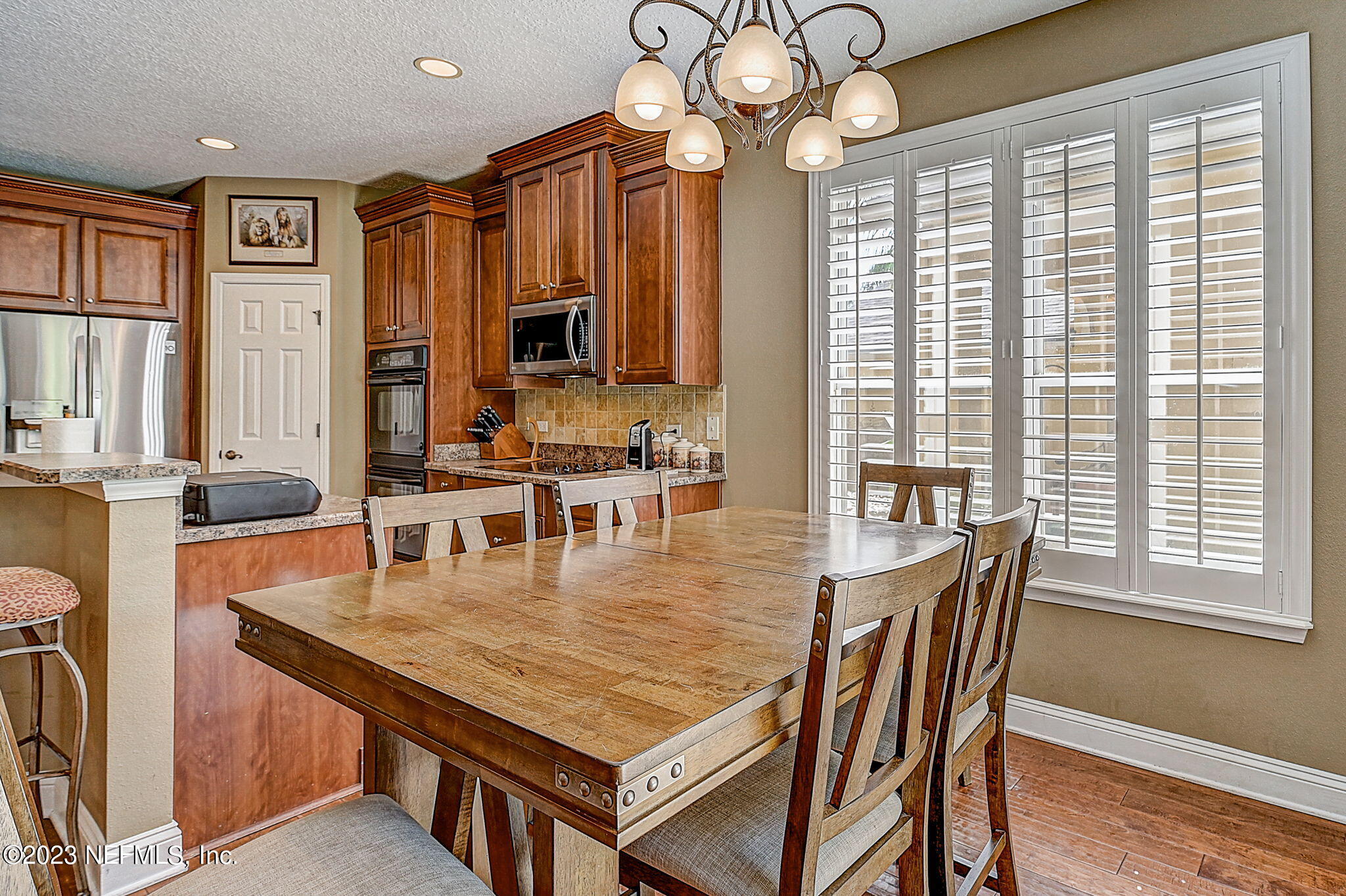 1828 Rear Admiral Lane St. Johns, FL 32259 - Photo 12 of 48 a dining table with a large window
