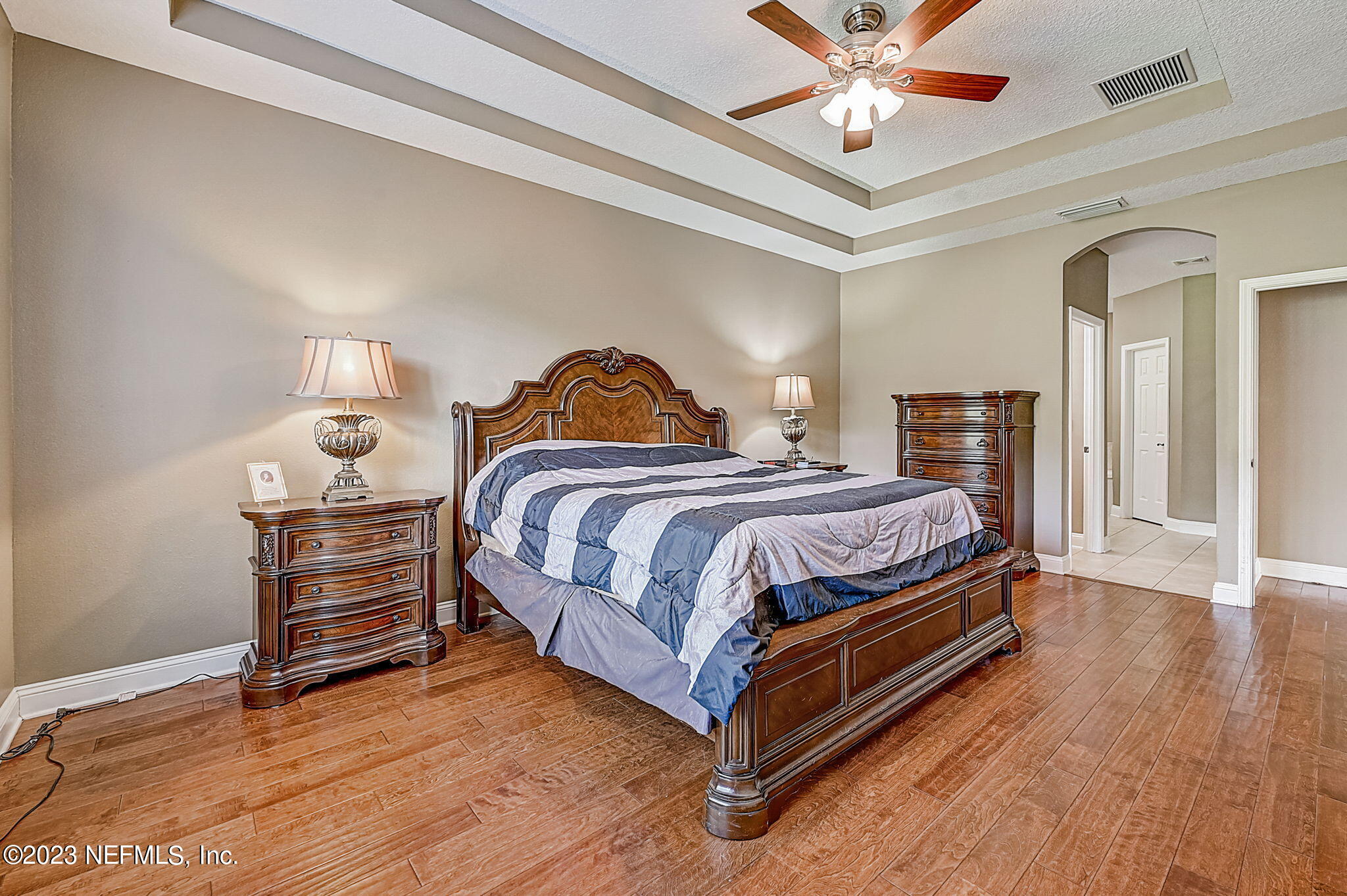 1828 Rear Admiral Lane St. Johns, FL 32259 - Photo 20 of 48 a bedroom with a bed and wooden floor
