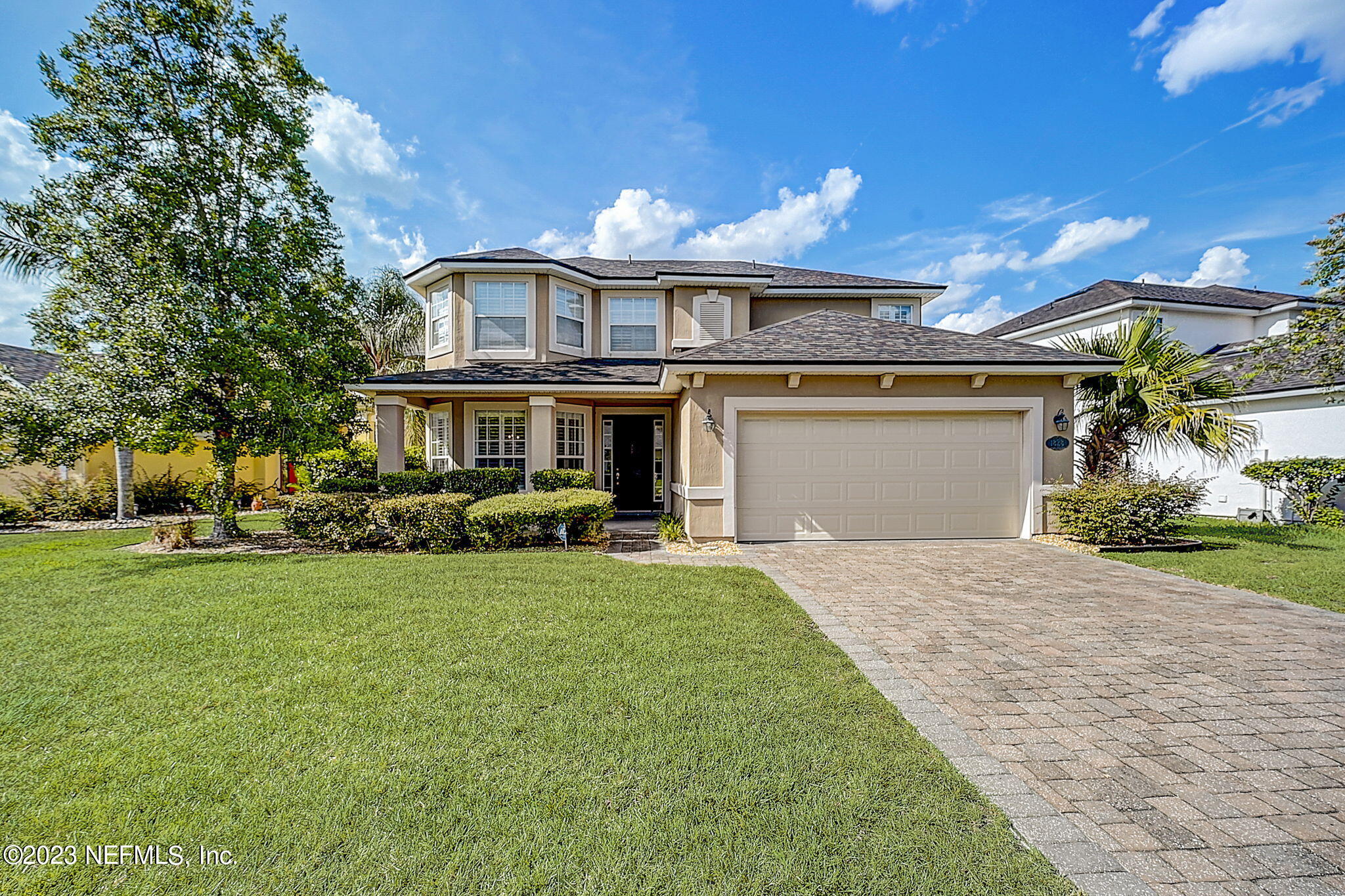 1828 Rear Admiral Lane St. Johns, FL 32259 - Photo 2 of 48 a view of a yard in front of house