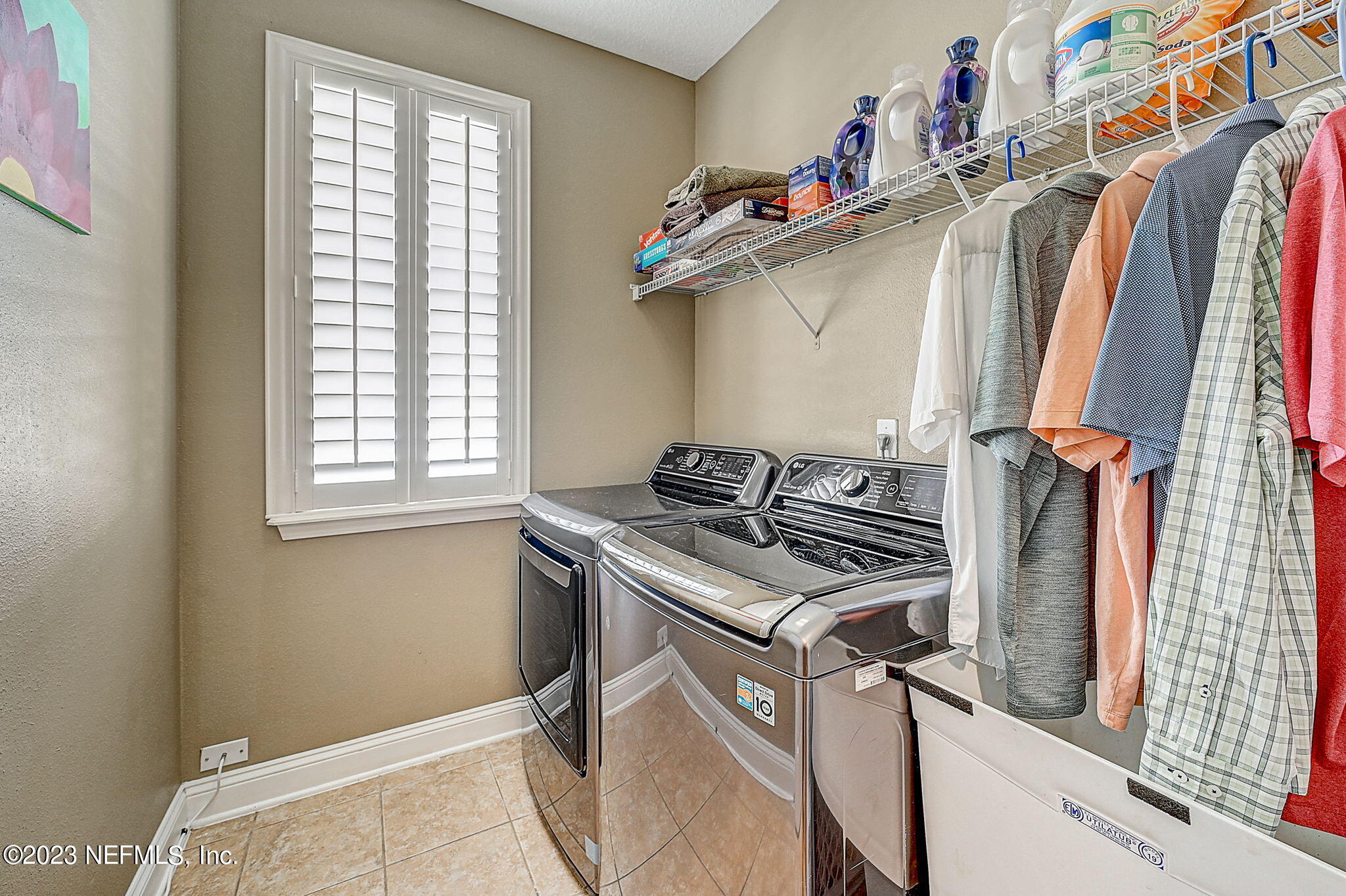 1828 Rear Admiral Lane St. Johns, FL 32259 - Photo 23 of 48 a utility room with dryer and washer