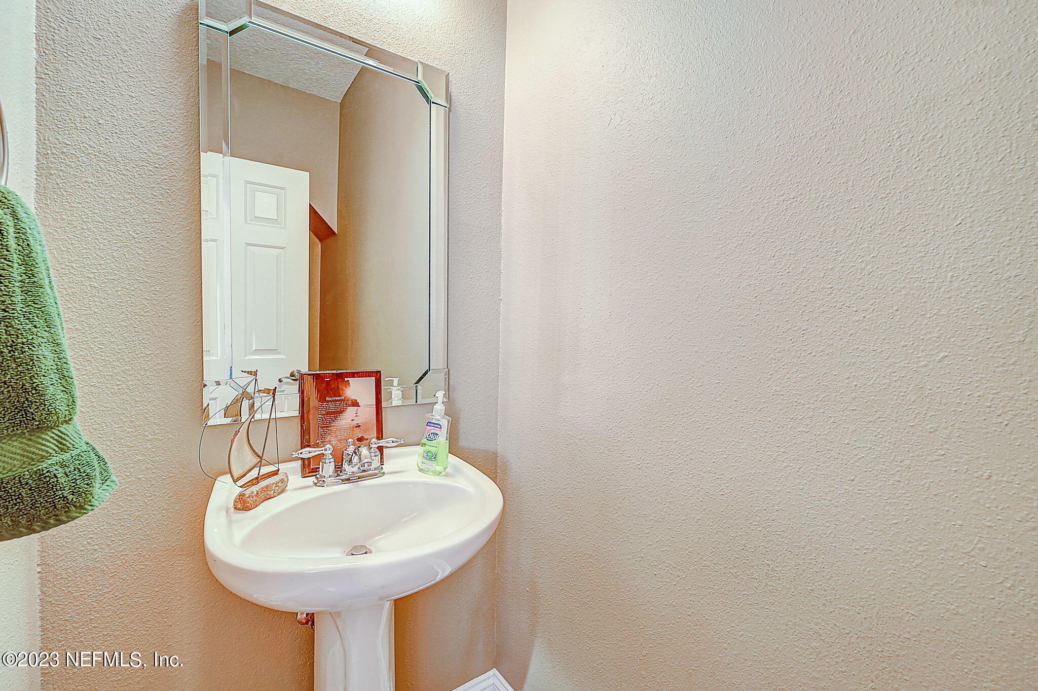1828 Rear Admiral Lane St. Johns, FL 32259 - Photo 24 of 48 a bathroom with a sink and a mirror