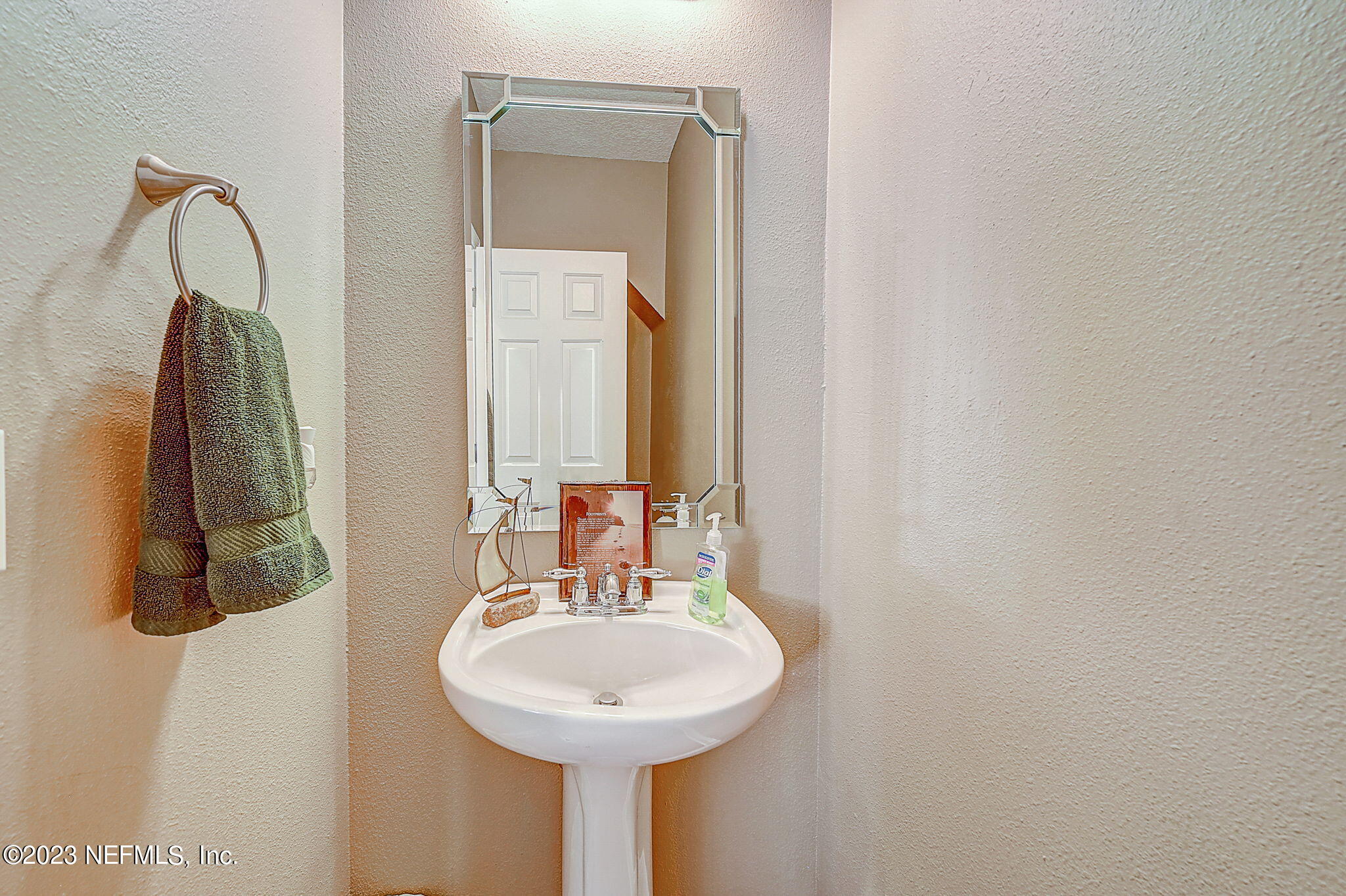 1828 Rear Admiral Lane St. Johns, FL 32259 - Photo 25 of 48 a bathroom with a sink and a mirror