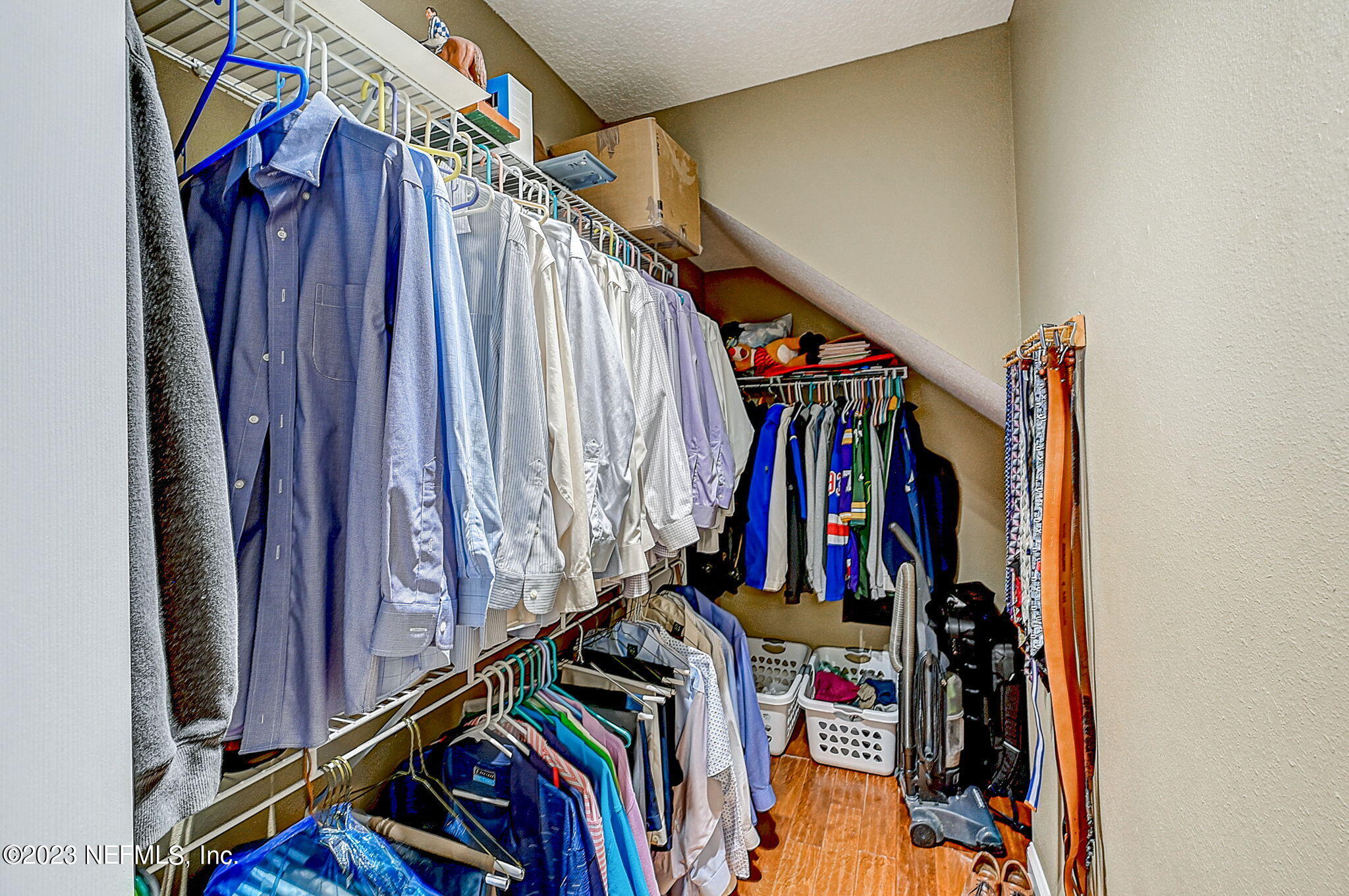 1828 Rear Admiral Lane St. Johns, FL 32259 - Photo 26 of 48 a view of walk in closet with clothes