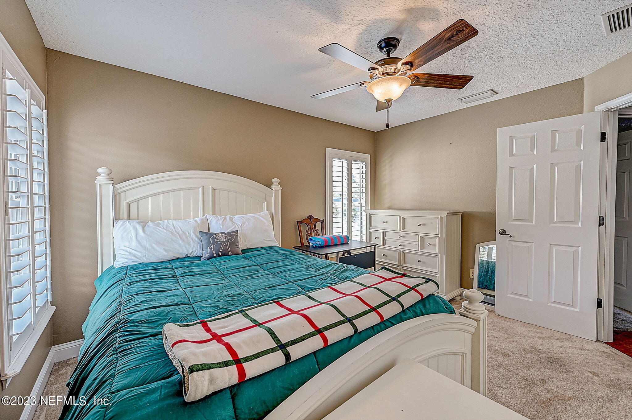 1828 Rear Admiral Lane St. Johns, FL 32259 - Photo 28 of 48 a bedroom with a bed and window