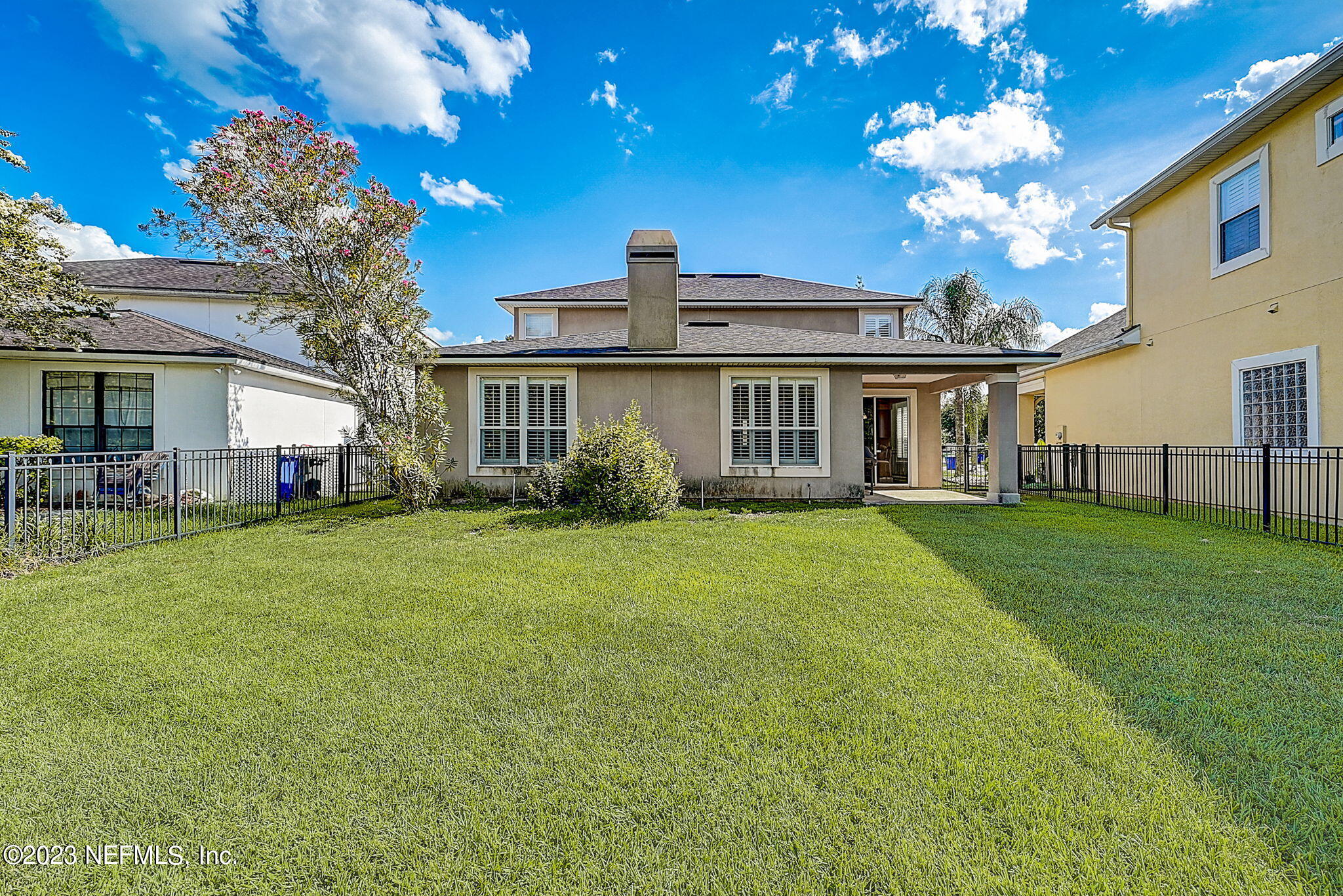 1828 Rear Admiral Lane St. Johns, FL 32259 - Photo 38 of 48 a front view of a house with a garden